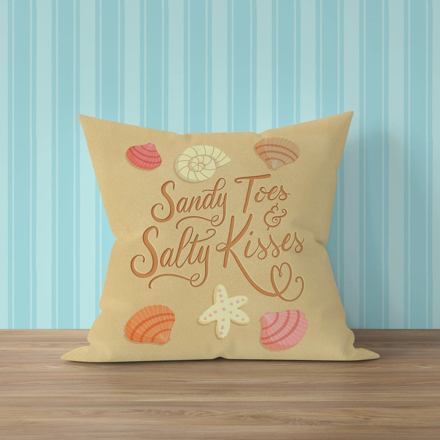 A photo of a decorative pillow with the saying Sandy Toes and Salty Kisses