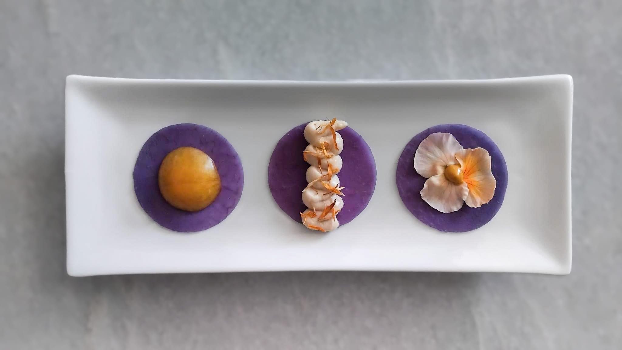 Ice blue kohlrabi circles with different flower topping