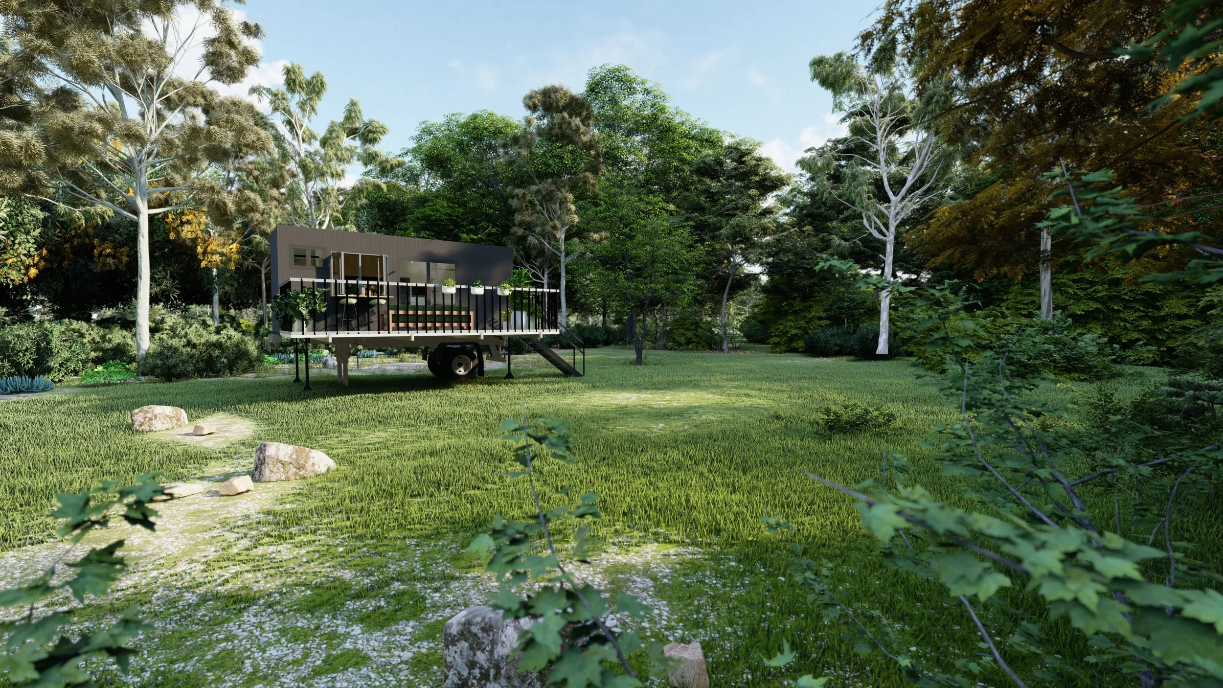 A tiny house on wheels with a staircase and surrounded by lush trees and grass in a park or wooded area.