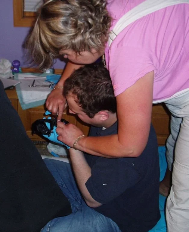 Matt and Cindy work on cords-C.JPG
