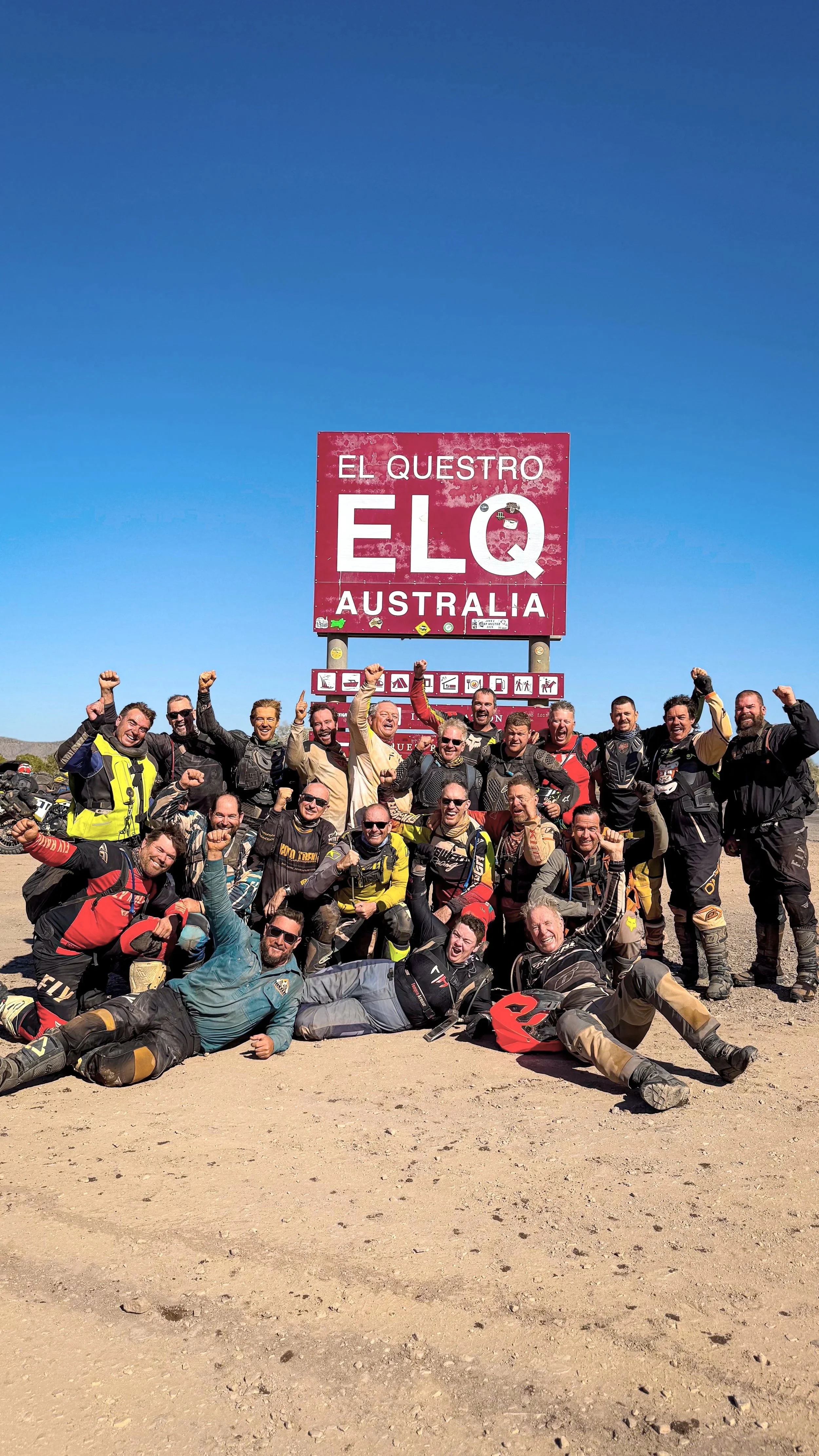 Adventure motorcycle riders celebrating at El Questro during a Kimberley outback tour on the Gibb River Road Western Australia