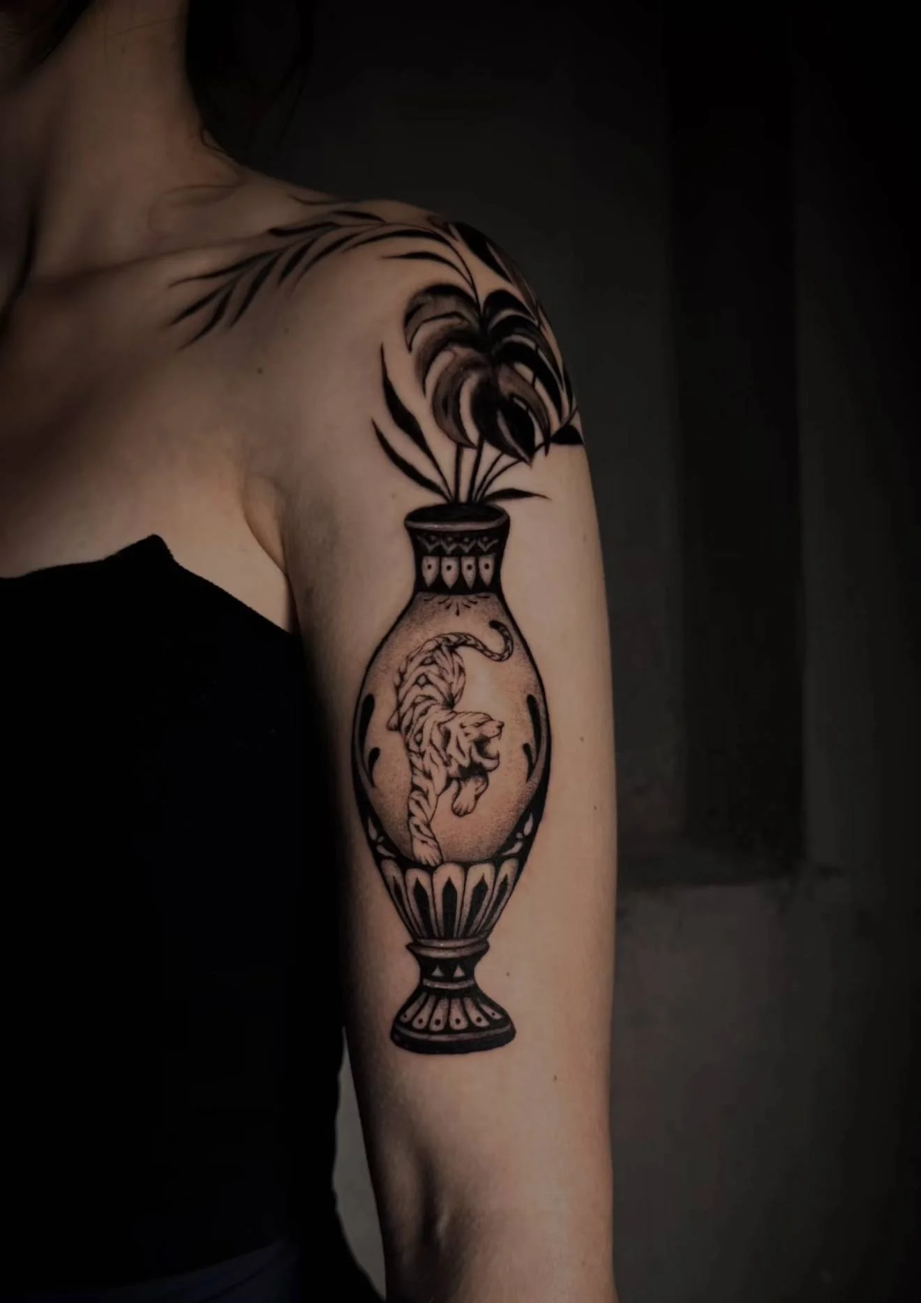 Botanical tattoo featuring vase, tiger, and monstera leaves with cymatic detailing, San Francisco