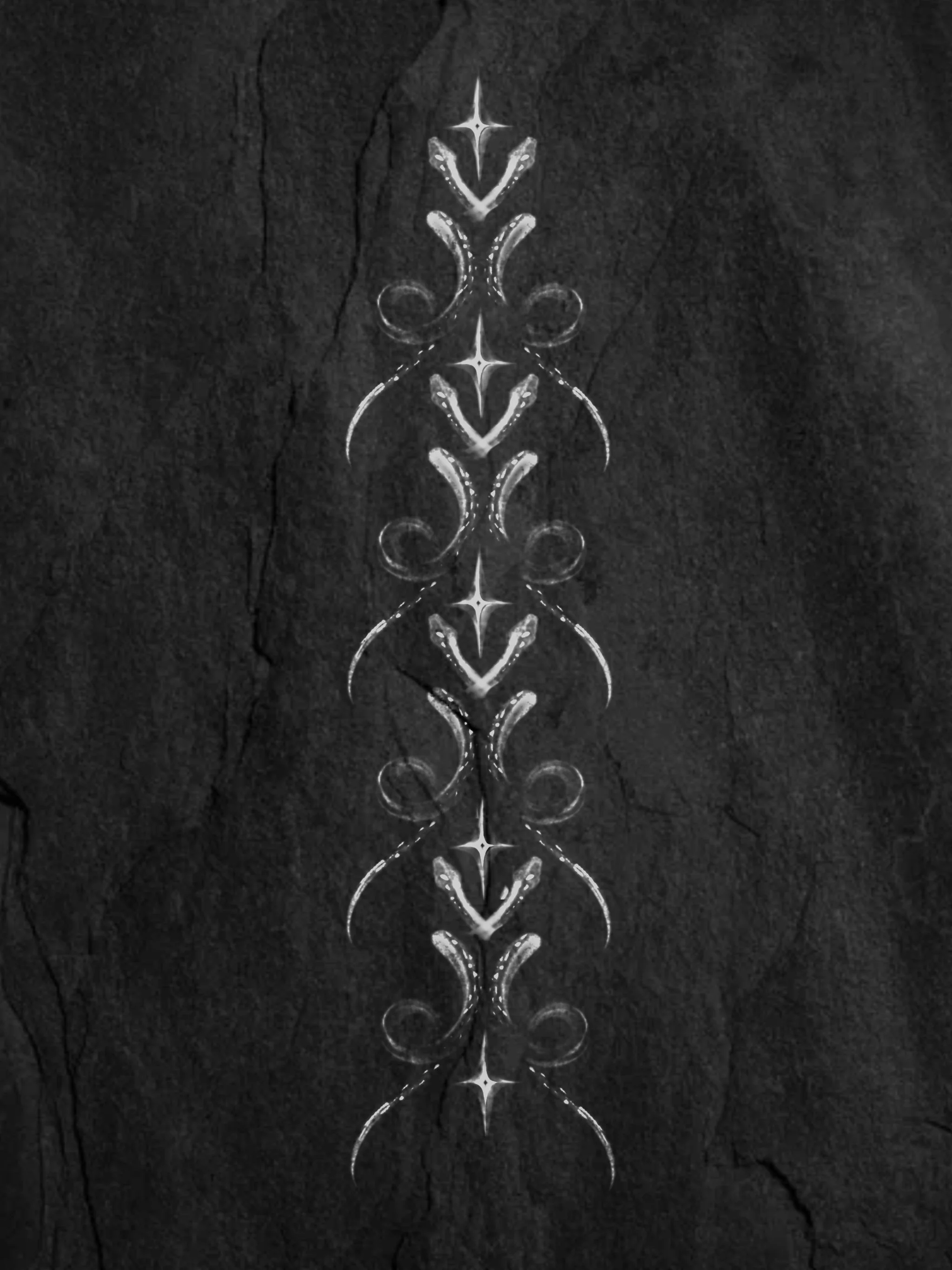 A vertical line of symmetrical, decorative, glowing white patterns on a dark background.