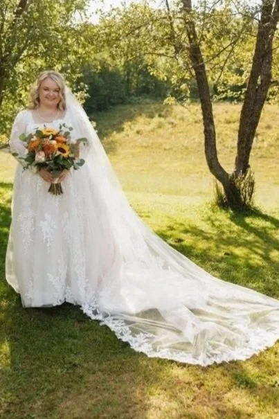 Bridal Alteration: hem, lace bodice modification, take in sides. 