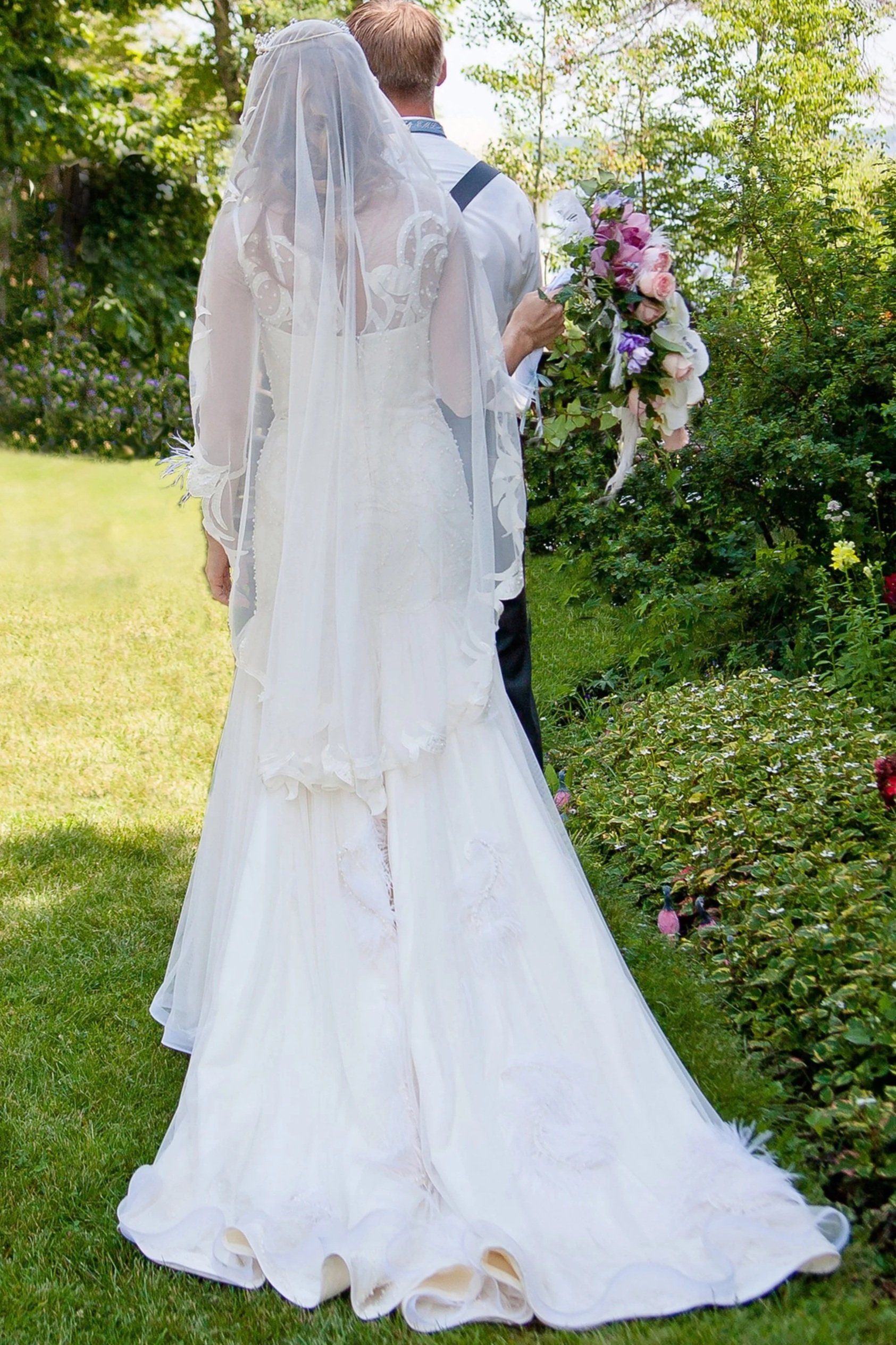 Custom made wedding dress: built-in corset, hand-beaded, lace hem, horsehair hem.