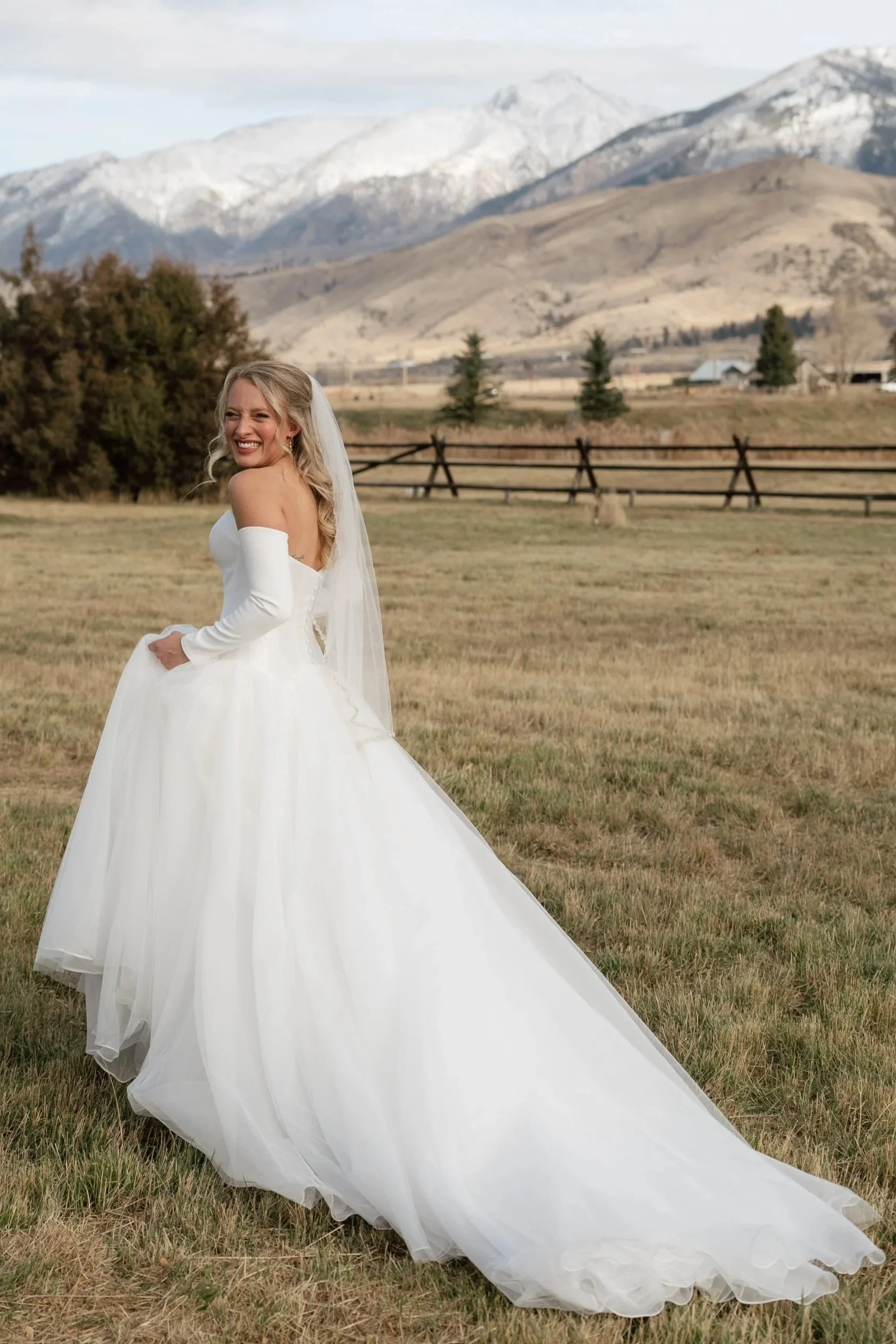 Bridal Alteration: Rolled edge hem, cut edge (tulle), & bustle.
