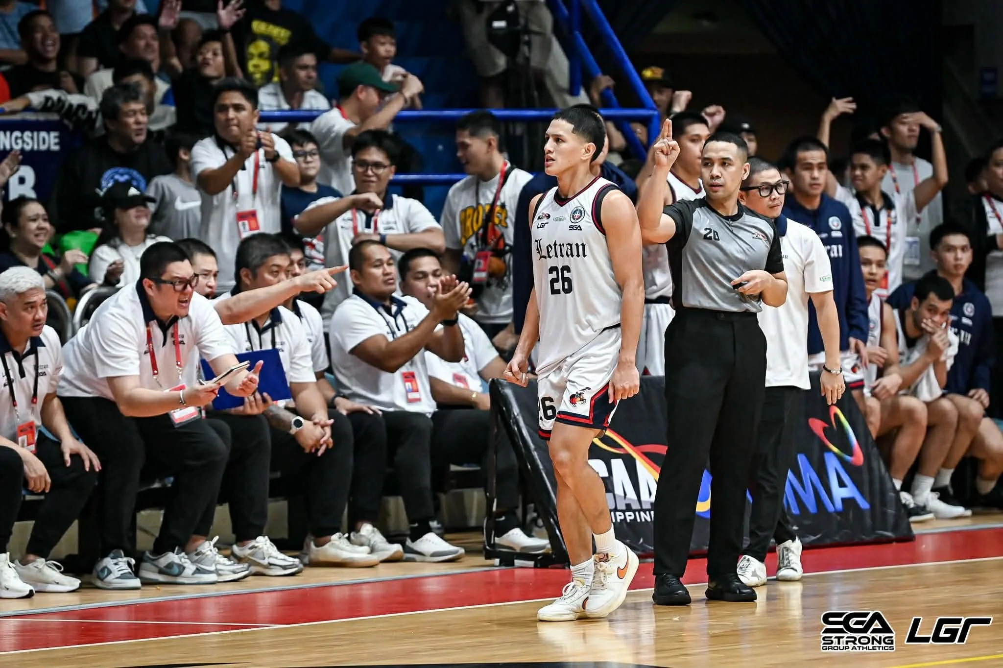 LETRAN KNOCKS OUT ARELLANO TO SECURE SEMIS SPOT