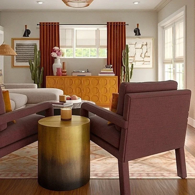 Boho desert modern bedroom design for Mayan Revival house in Los Angeles, featuring mulberry velvet chairs, brass end table, teal accent wall, and curated global textiles, virtual interior design by Ravenwood Interiors