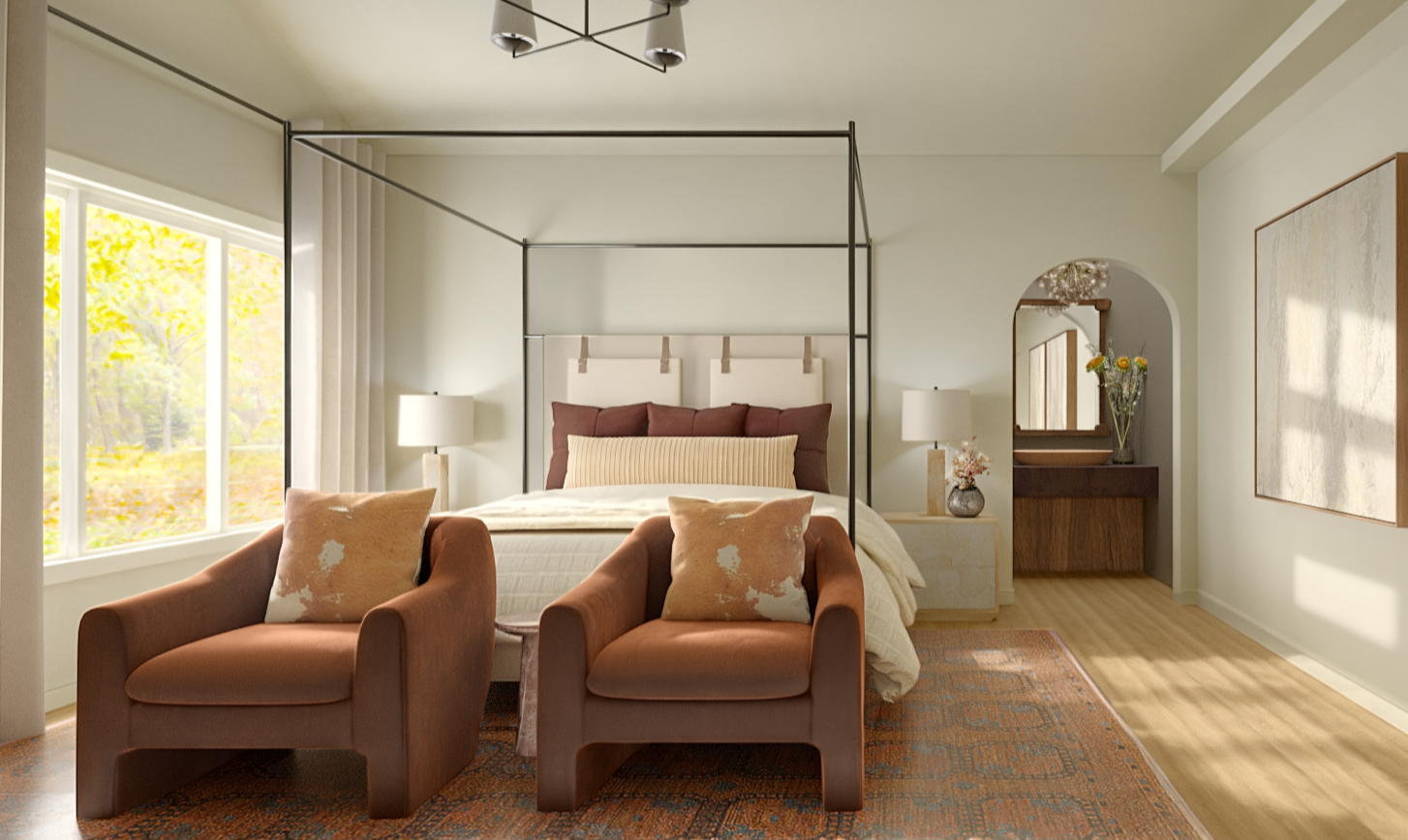 A bedroom with a canopy metal bed, two armchairs with pillows, a window with sunlight, and a dresser with a mirror and vases.