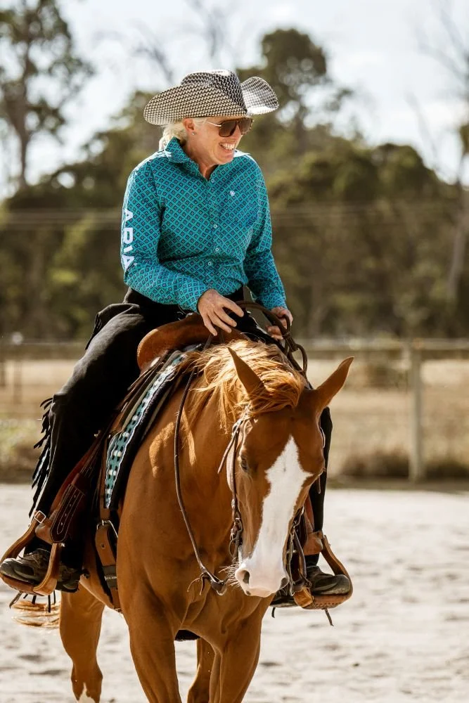 photo of horse and rider at a western reining event near Gravelly Beach Tasmania, captured by horse event photographer Amy Lyon