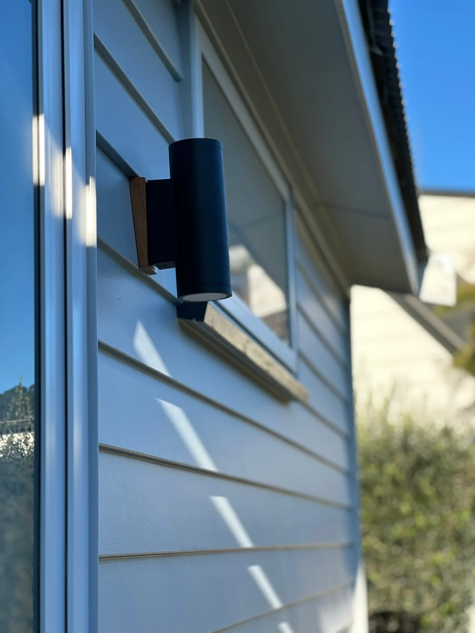 Close-up of a black outdoor light fixture
