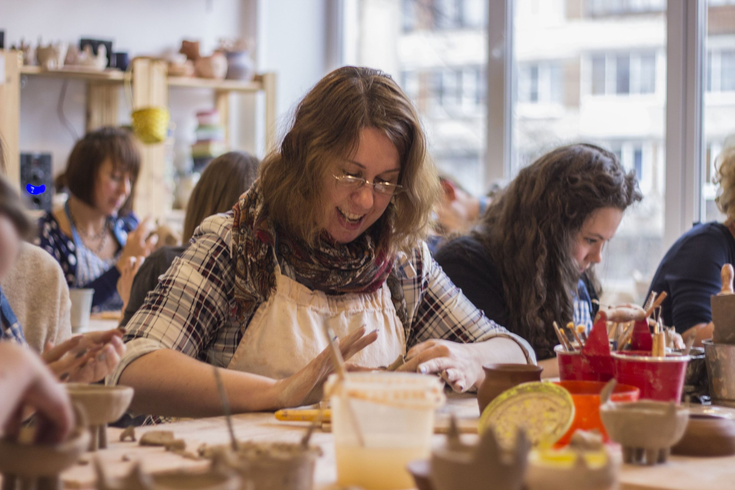 Pottery Munger Place close up of hands working with clay 