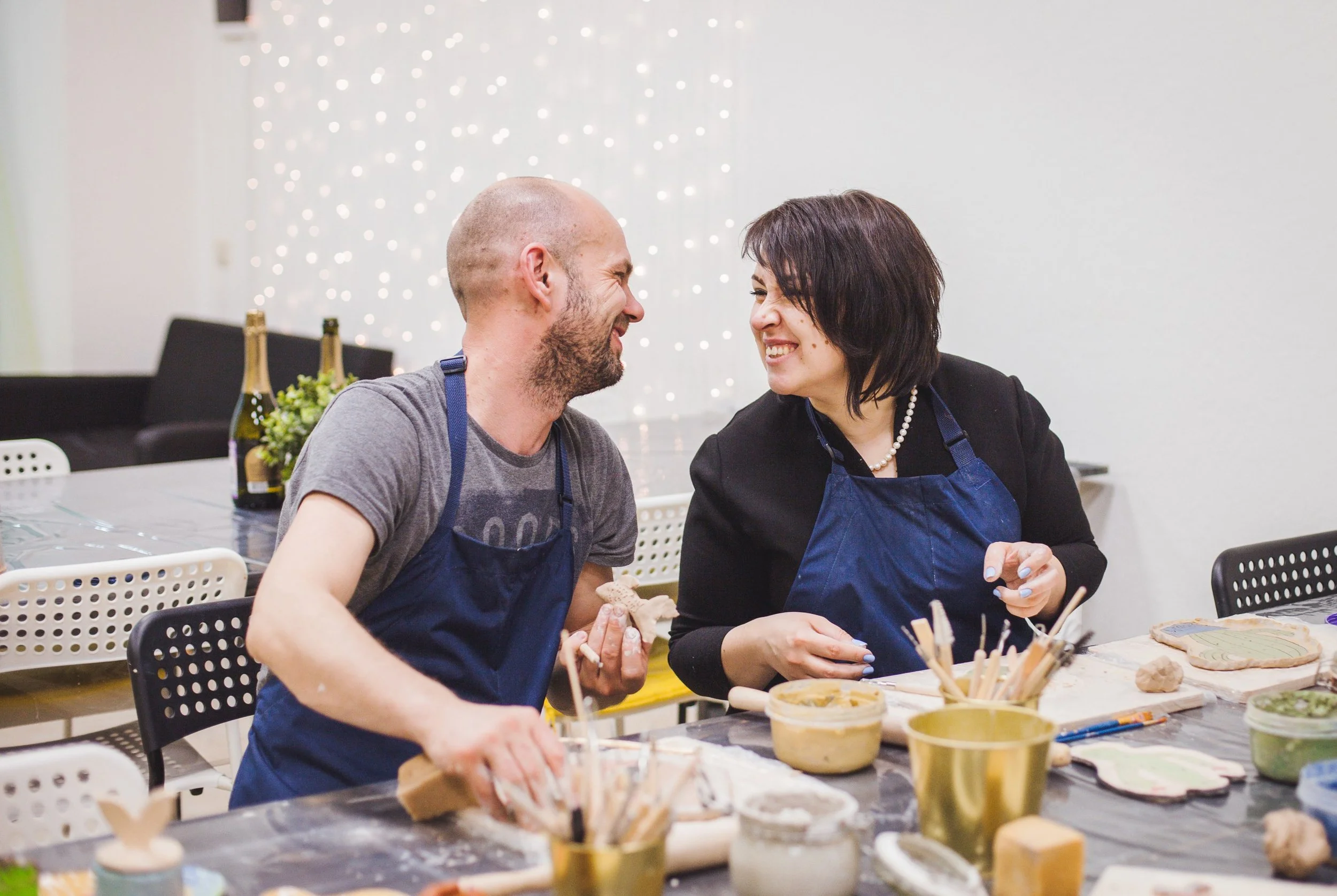 Pottery Deep Ellum colorful finished ceramic pieces on display
   