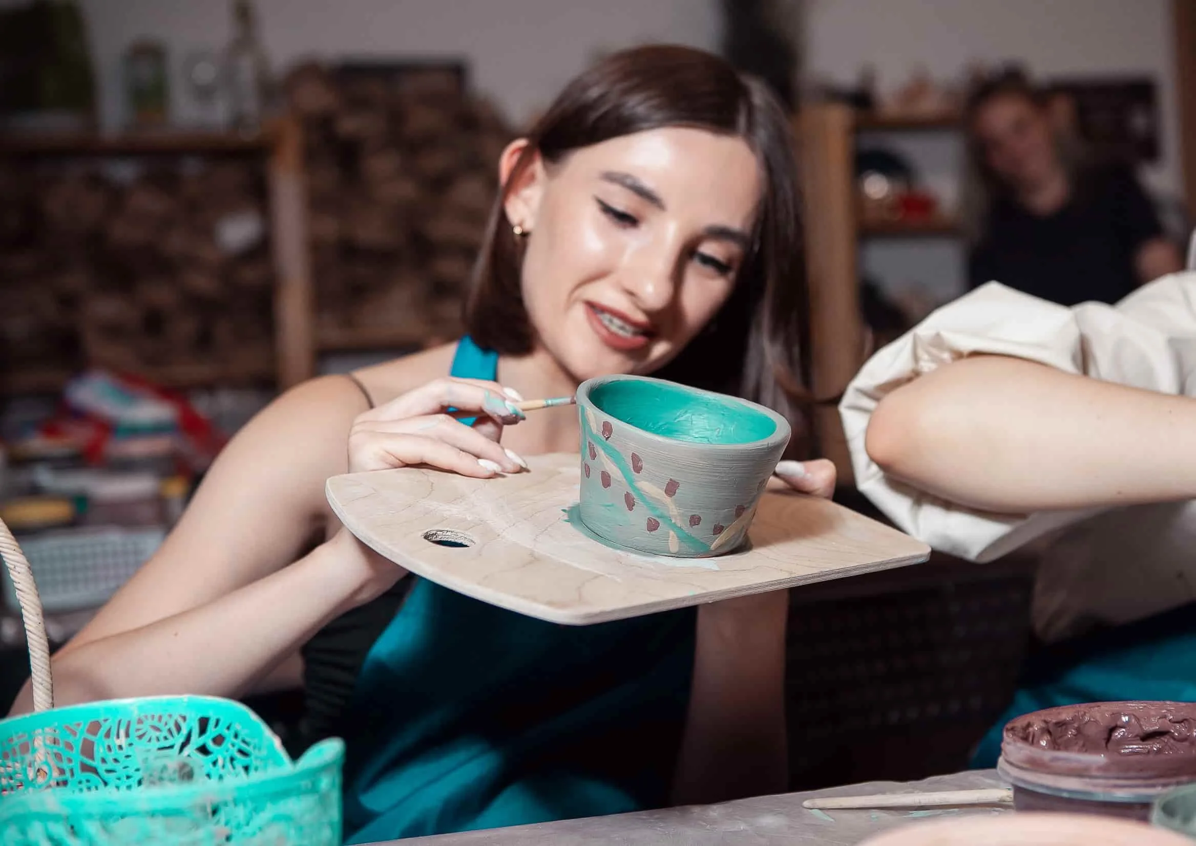 Pottery studio   Swiss Avenue interior with clay wheels and tools   