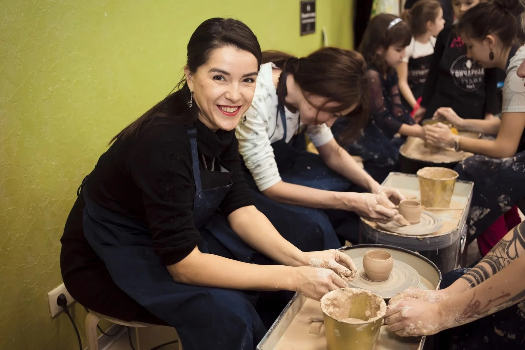 Creative workshop at pottery studio Swiss Avenue  with instructor guidance   