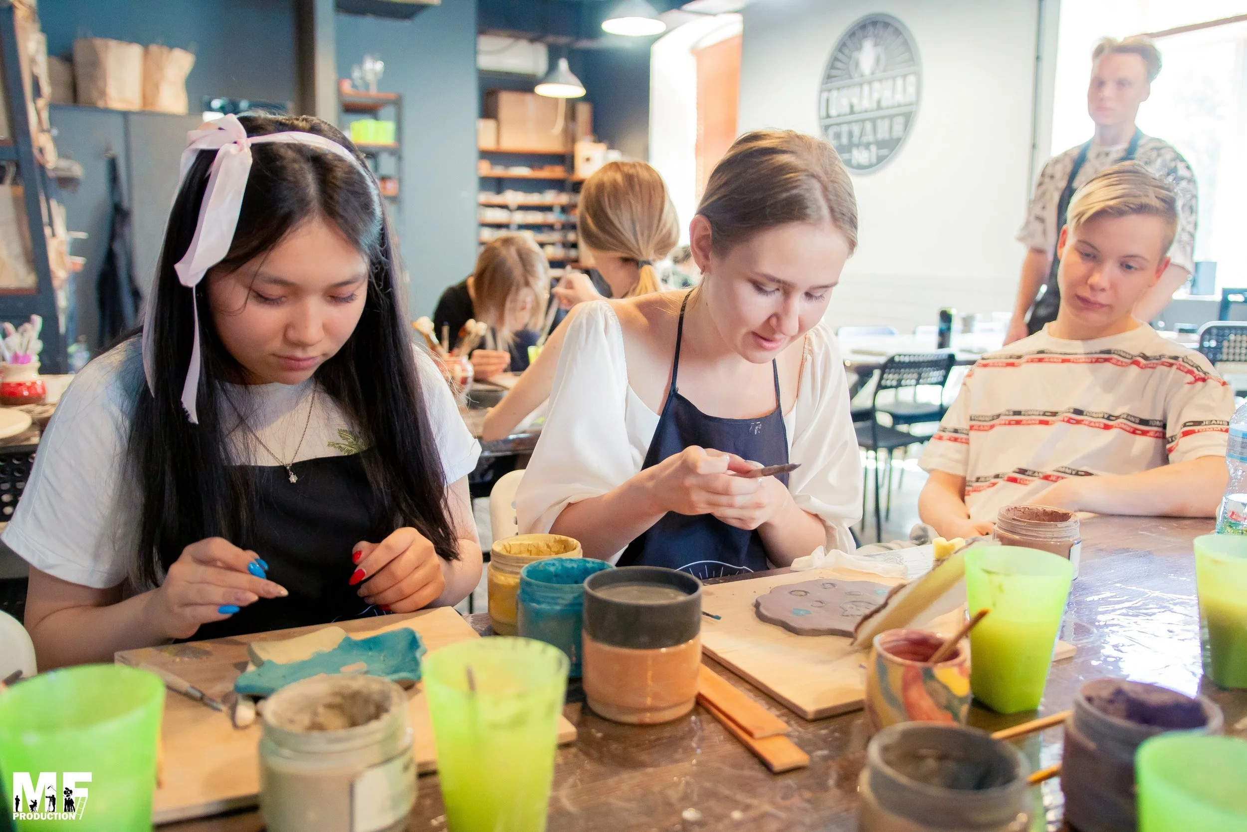 Pottery studio Munger Place creative atmosphere with pottery equipment  
