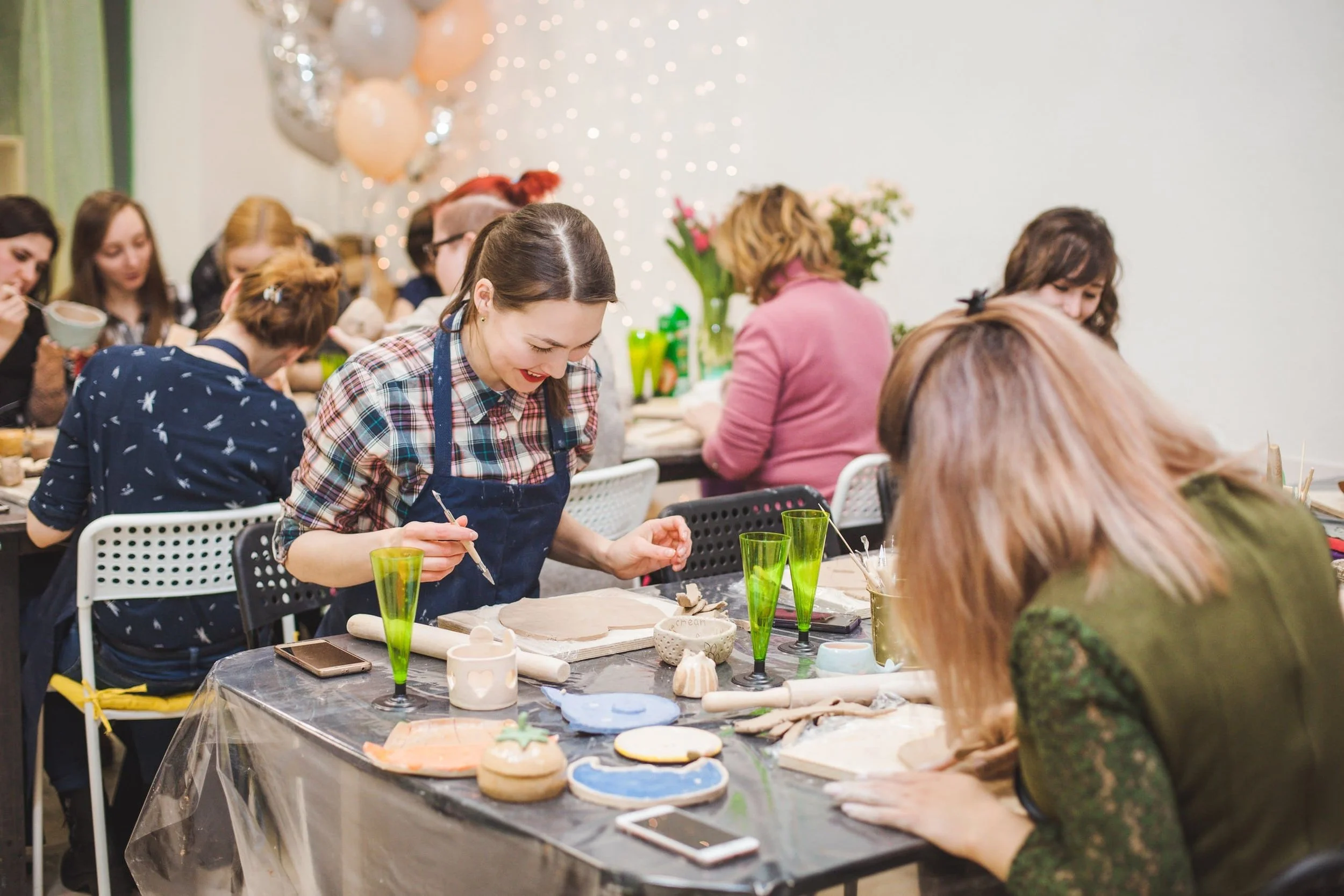 Pottery studio Junius Heights artists at work in the studio  