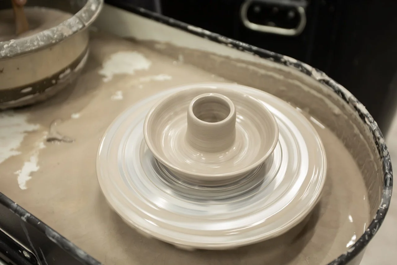 Pottery studio Bryan Place bright workspace with pottery wheels  