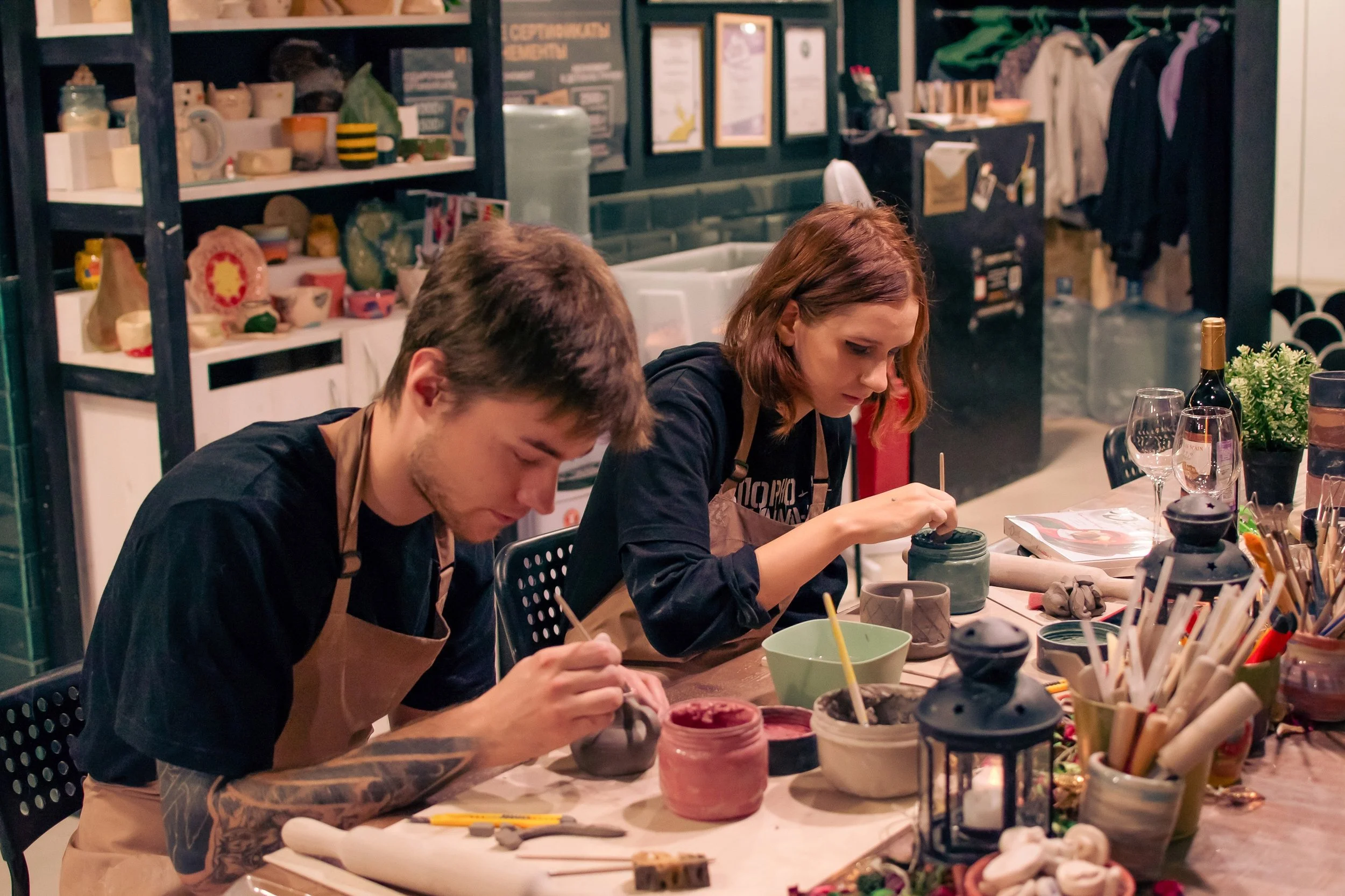 Pottery studio Junius Heights group enjoying a pottery workshop  