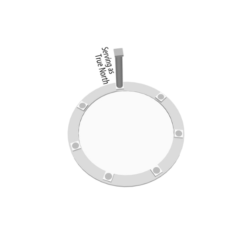 A white circular object with several small squares around its edge, a vertical cylindrical component attached to the top, and some black and white text or symbols near the top.