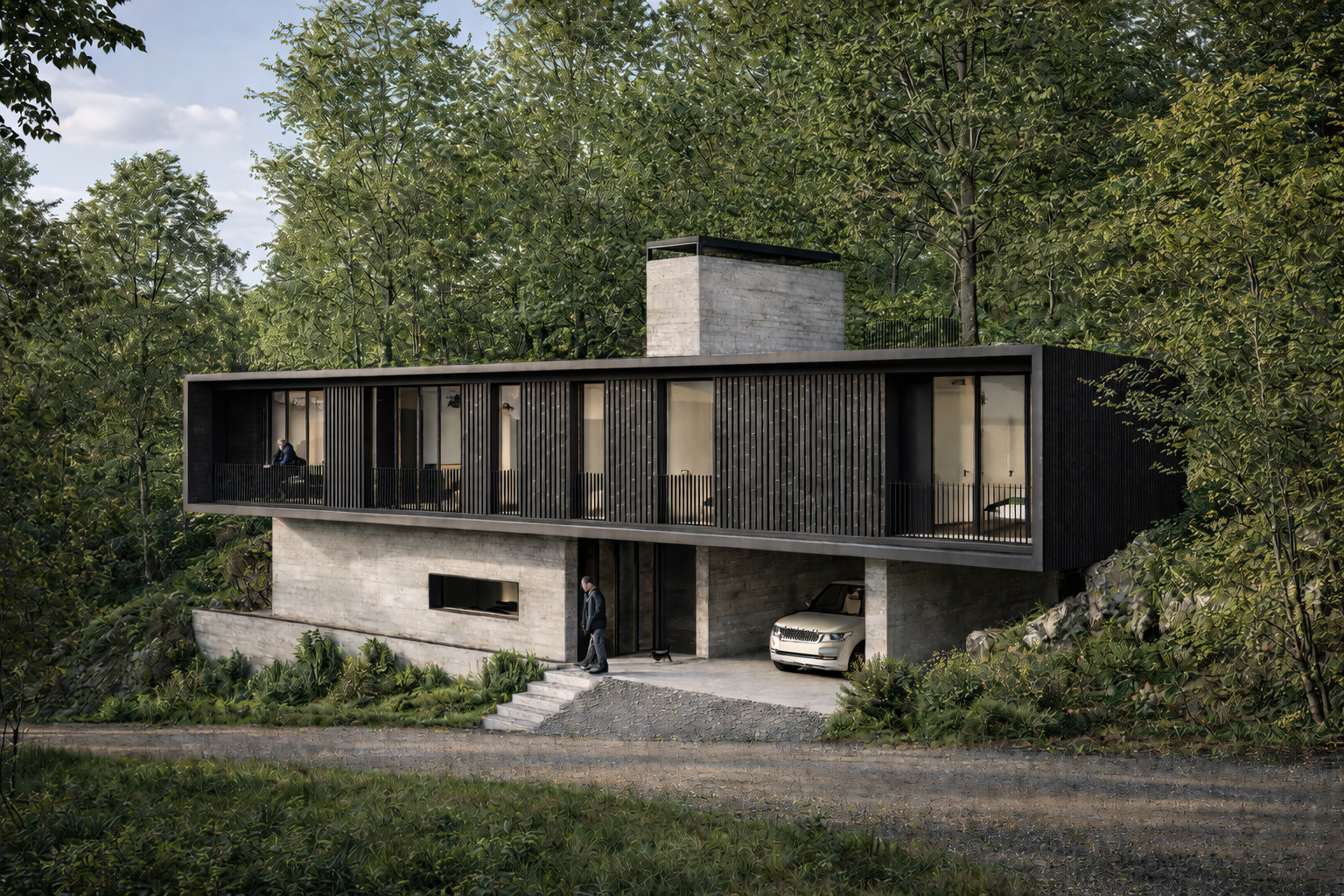Modern two-story house with concrete and black exterior, large glass windows and sliding doors, situated on a hillside surrounded by trees, with a man walking on the driveway and a white vehicle parked under the upper level.