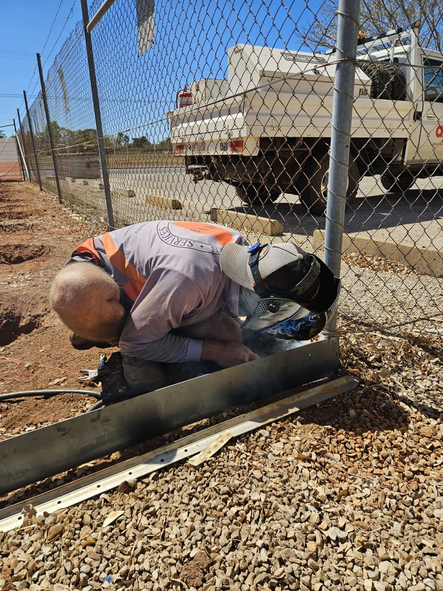 Welding a garden bed.