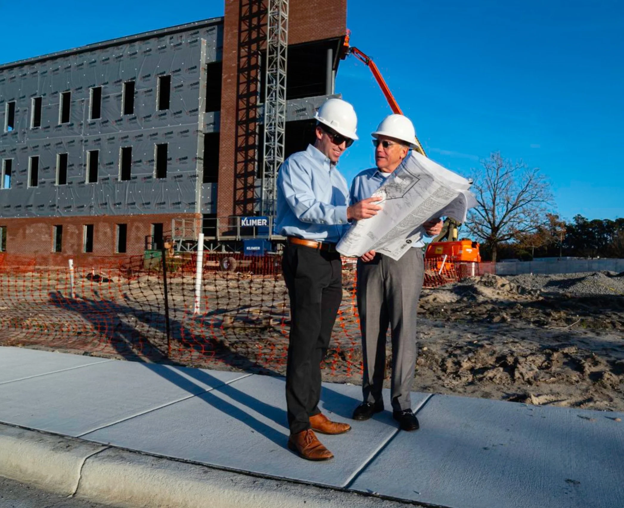 Construction site, two engineers with plans - Hendy Street.jpg