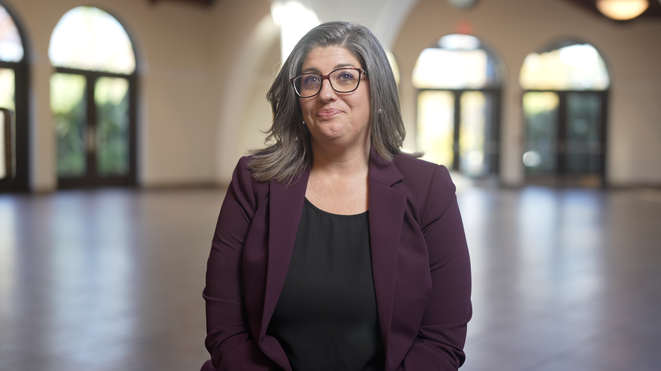Professional portrait in a bright atrium