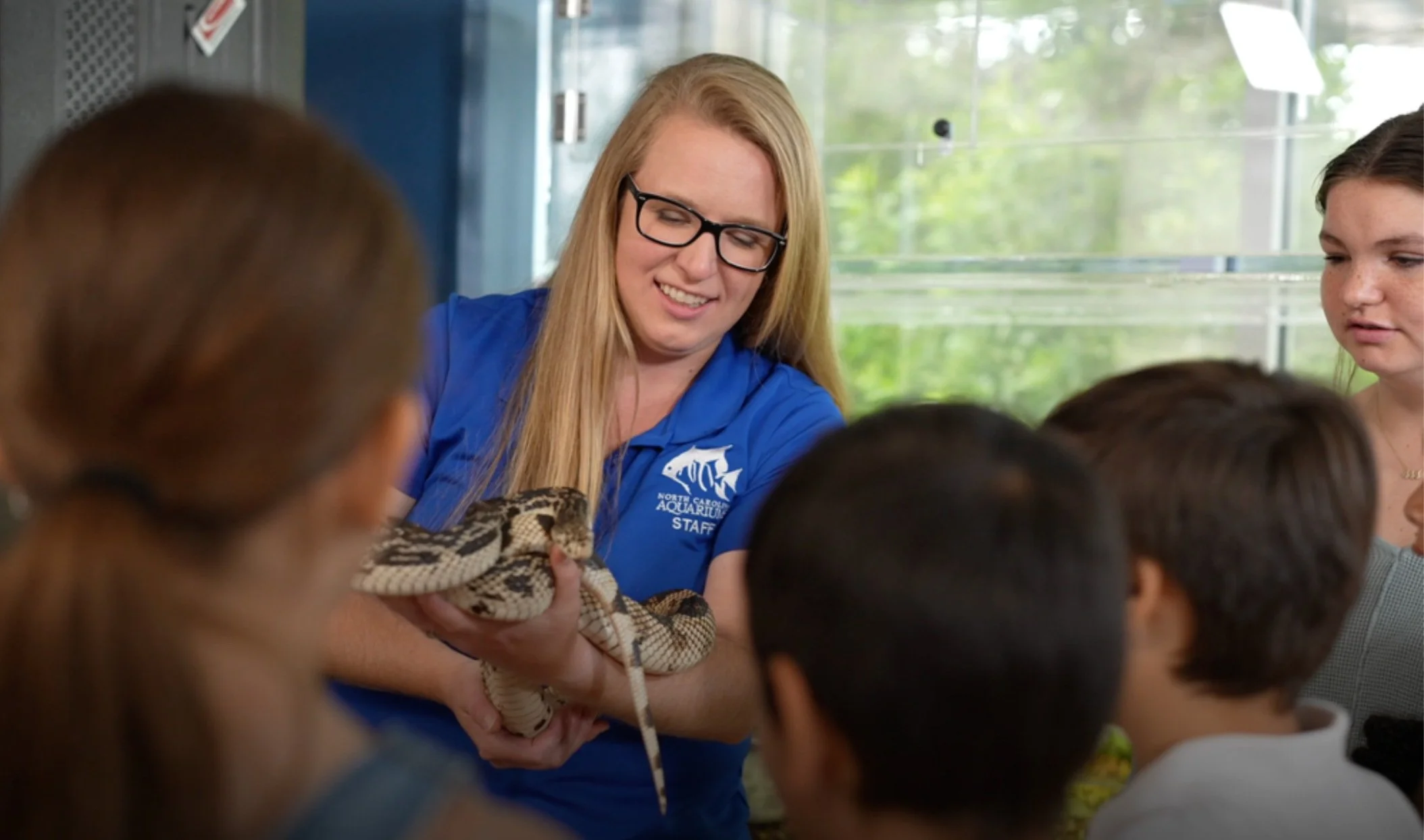 Educator with a snake, kids program - Hendy Street.jpg