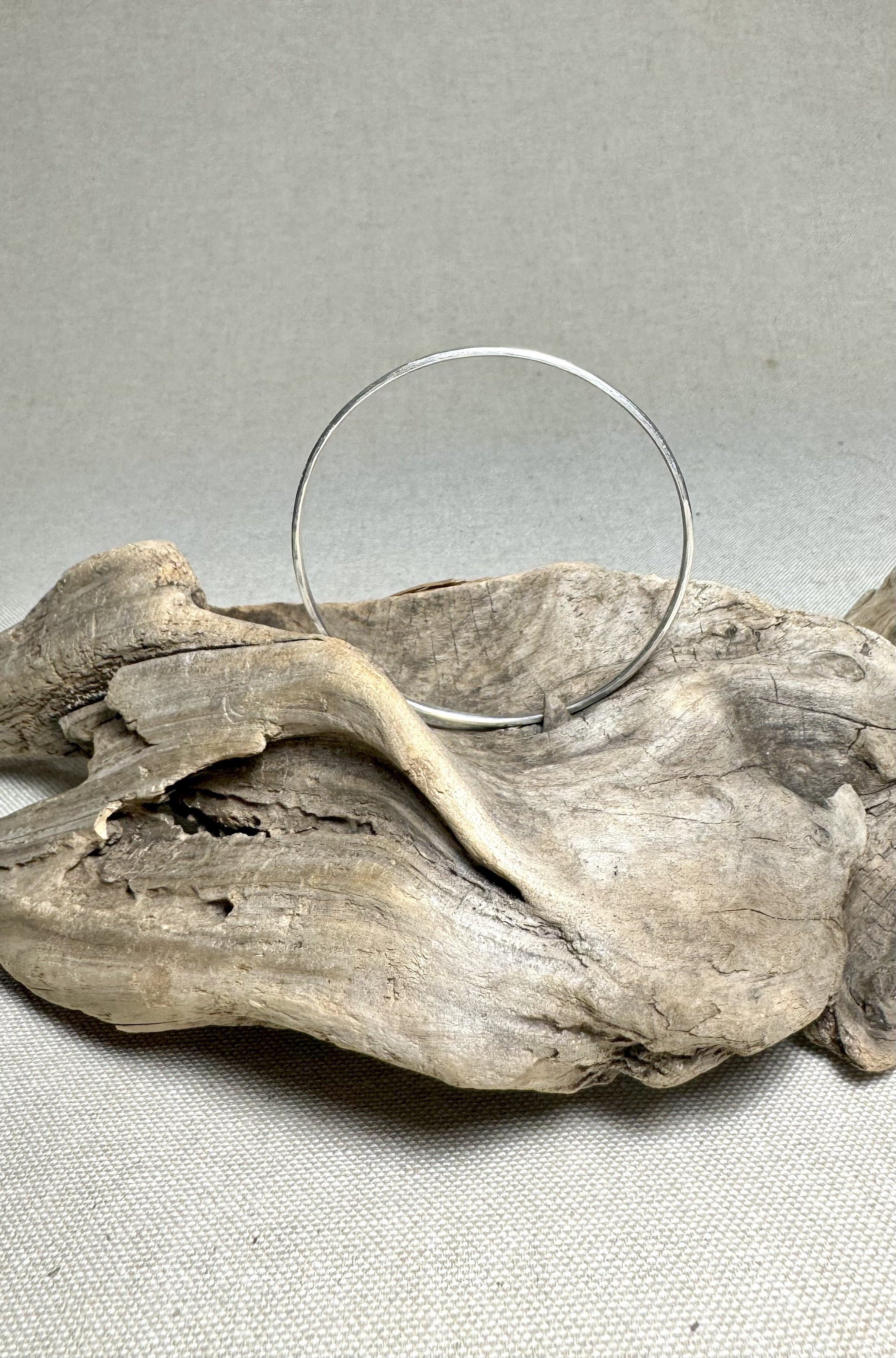 Silver hammered bangle