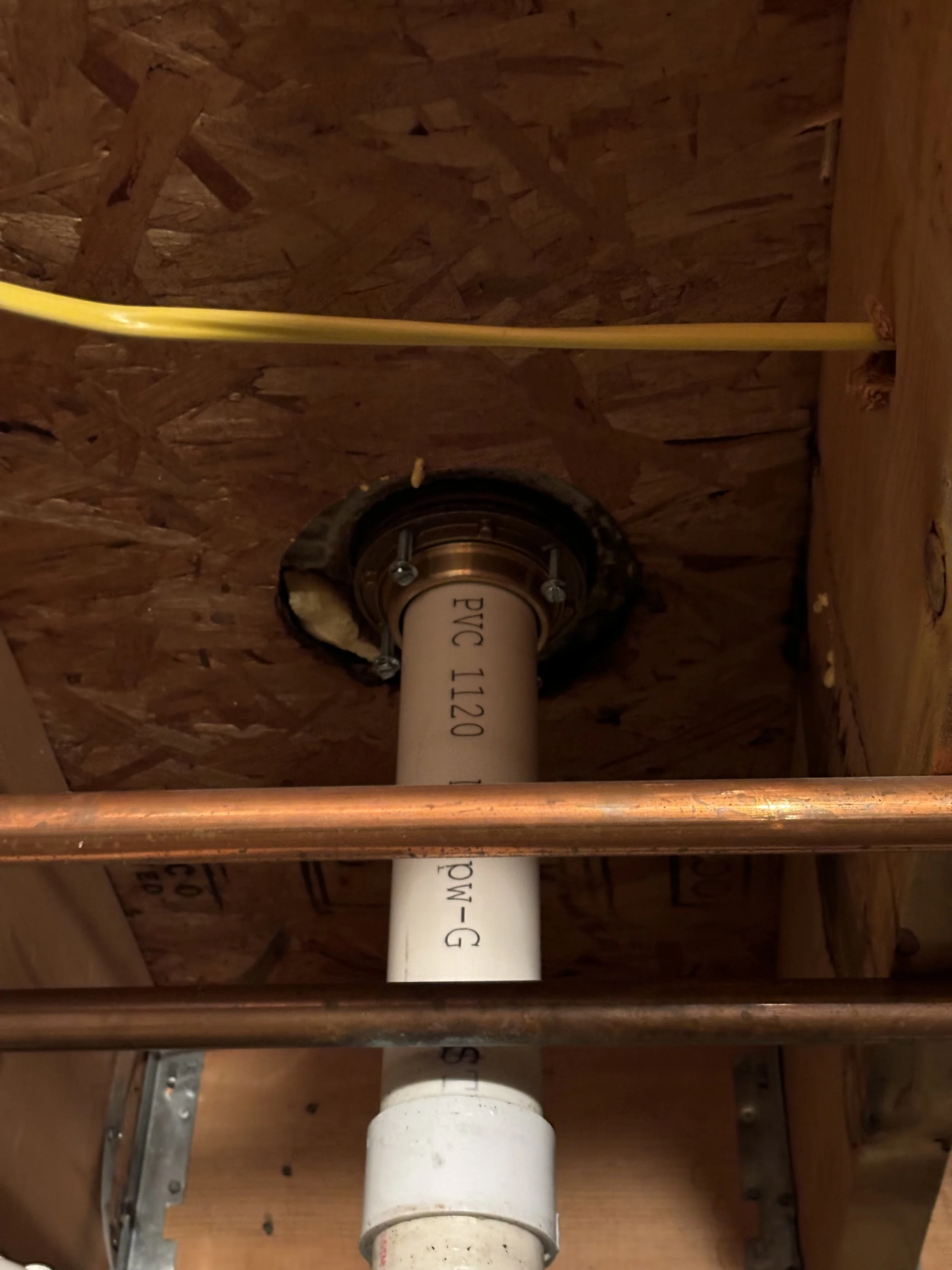 Shower drain leak repair by RonJon Plumbing in Hilliard, Ohio, featuring replacement of leaking shower strainer and jackrabbit fitting with new PVC connections sealed and tested.