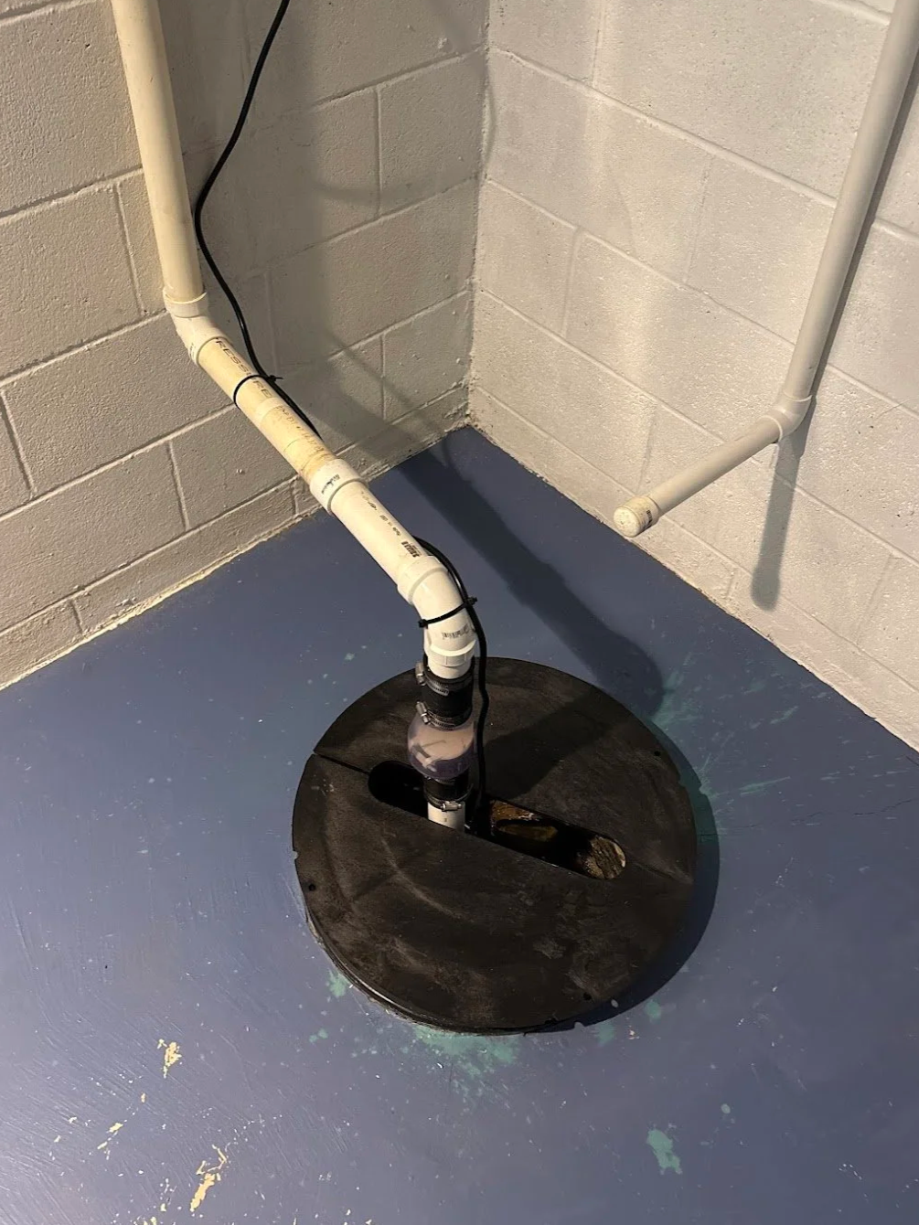 Zoeller sump pump installation completed by RonJon Plumbing in Sunbury Ohio for basement flood protection