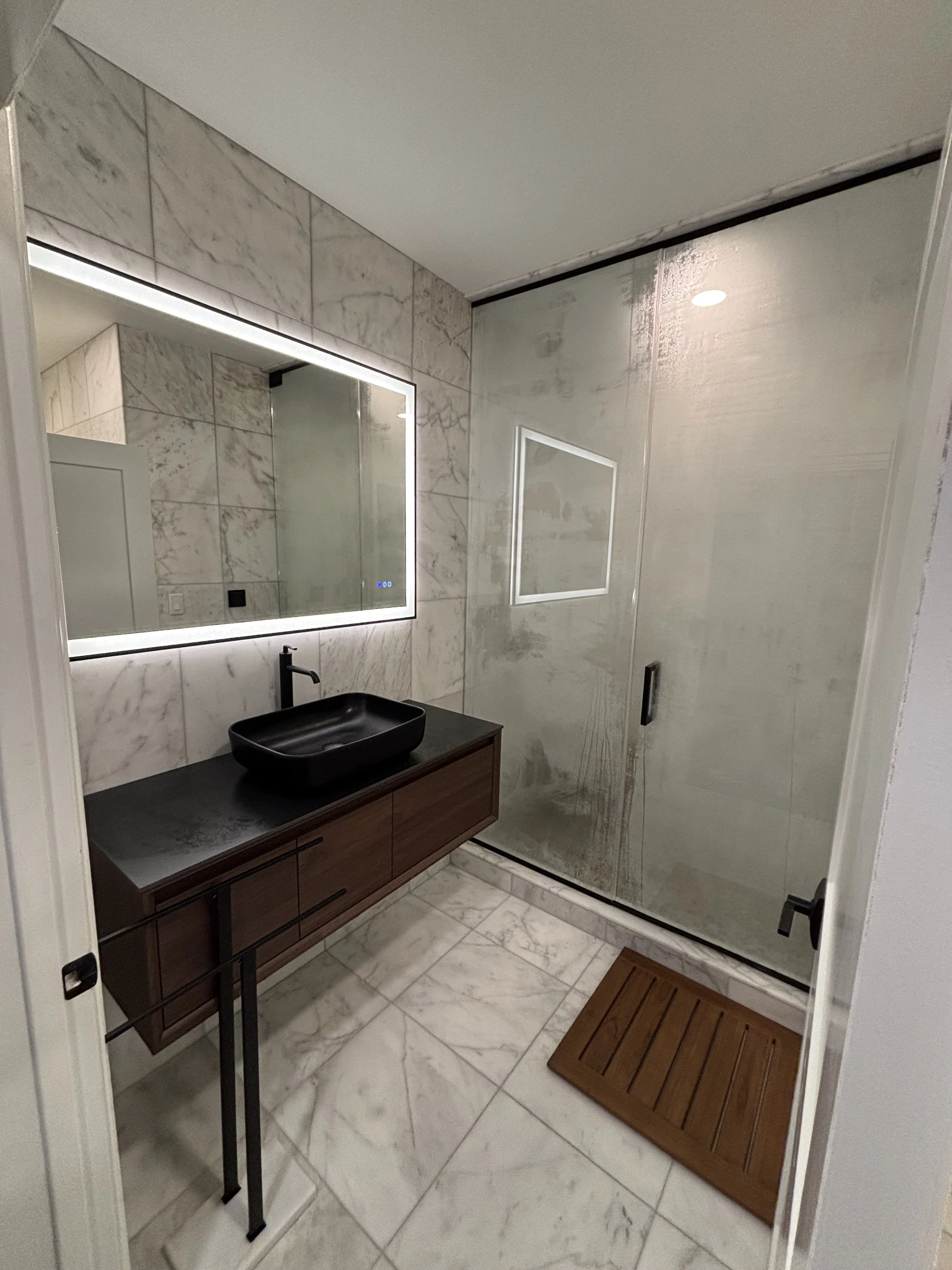 Bathroom remodel by RonJon Plumbing in Westerville, Ohio featuring walk-in shower installation, new waste and overflow, and professional licensed plumber services for homeowners searching for remodel plumbing near me.