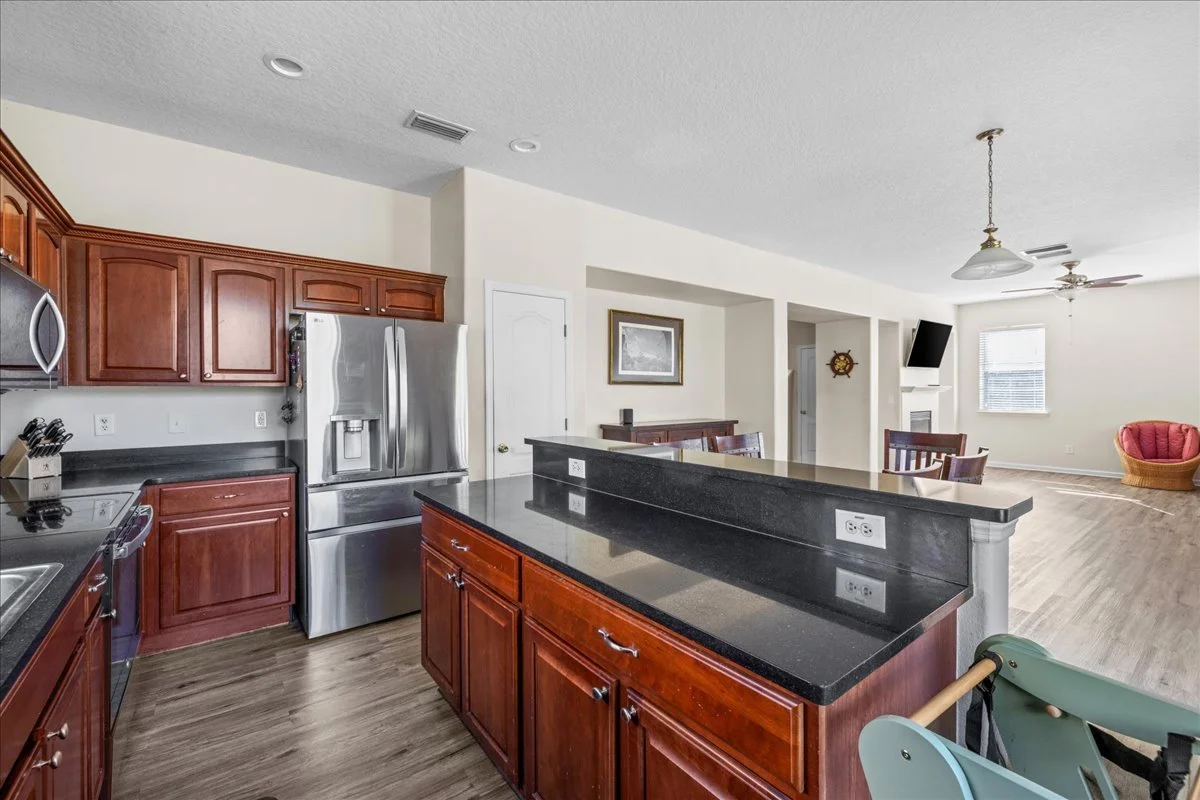 25-Kitchen to Dining.jpg