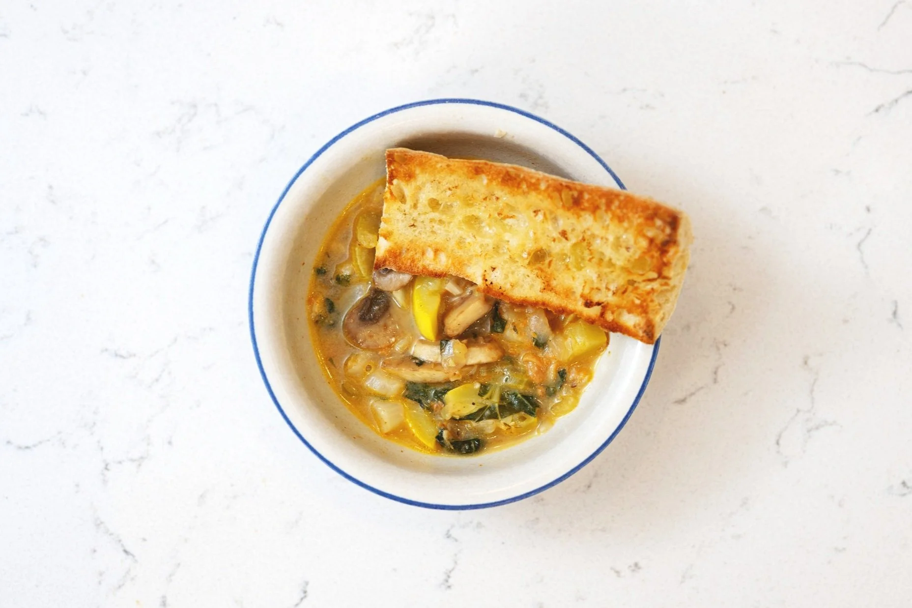 Blackened Cod and Vegetable Stew with Garlic Baguette