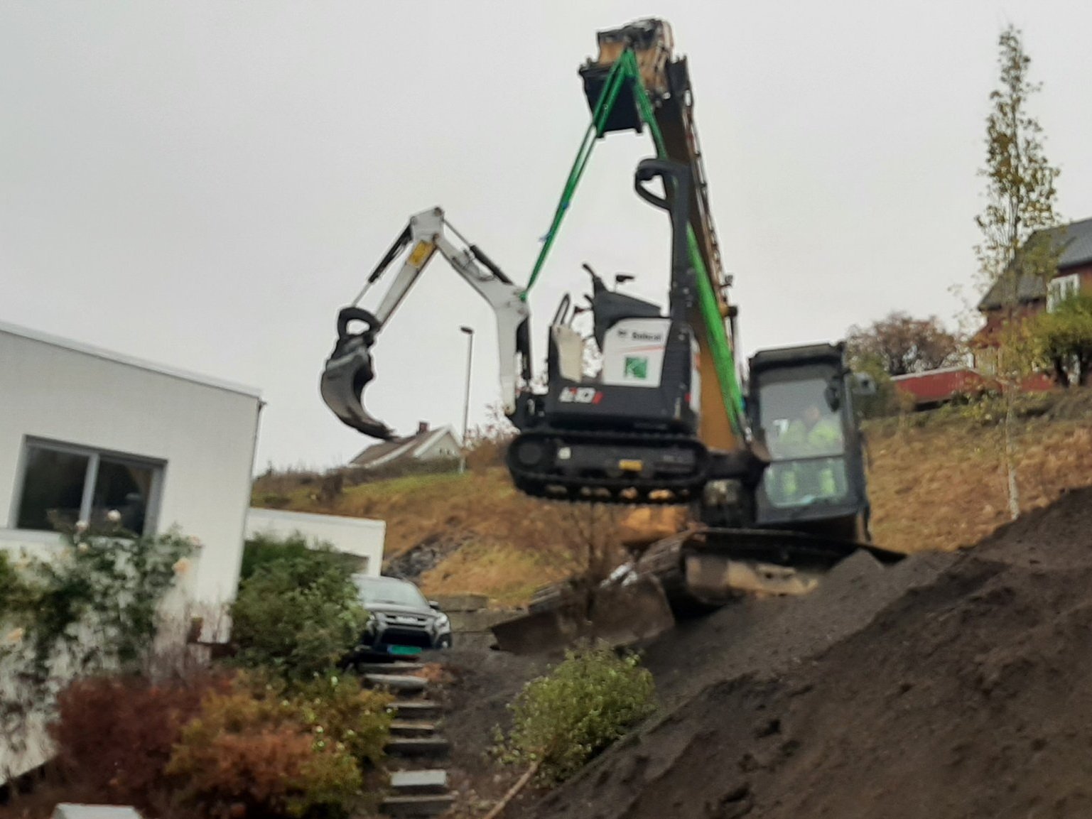 Grunnarbeid med gravemaskin