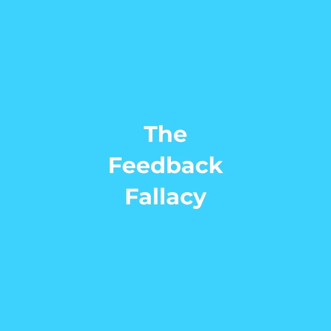 A blue background with white centered text that reads "The Feedback Fallacy".