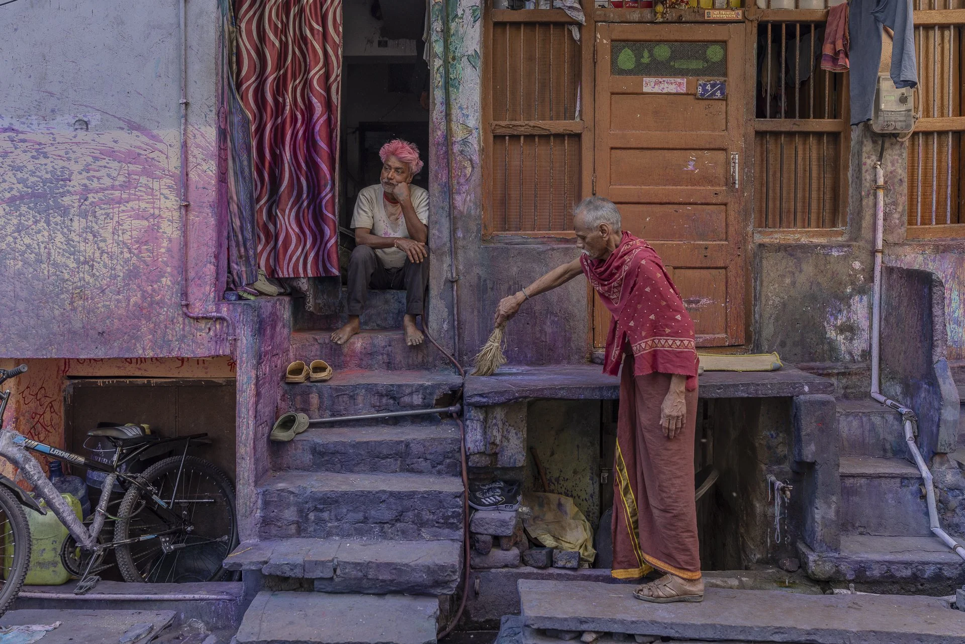  India 202 Man sitting front of house-1.jpg
