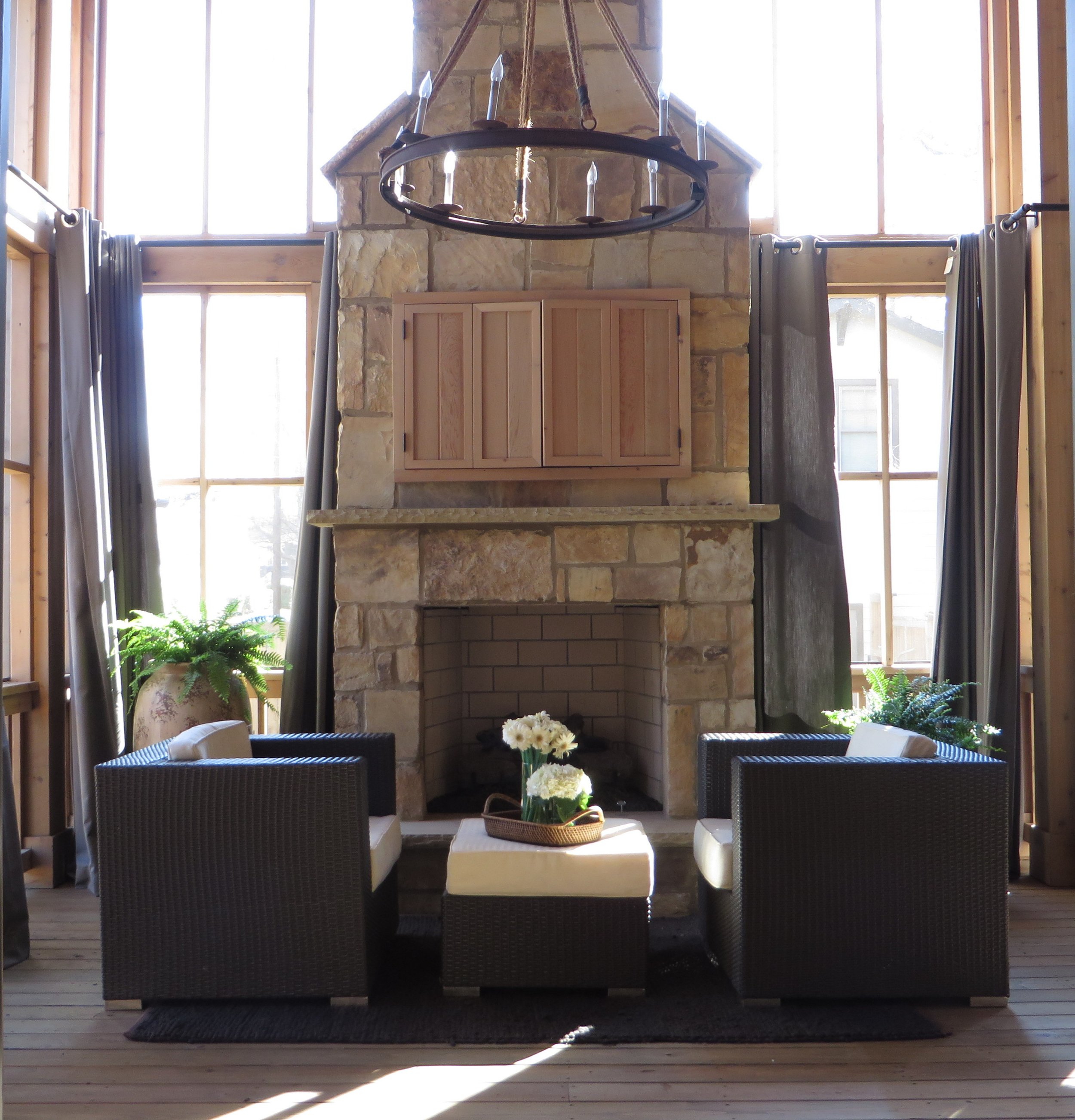 61. Screened Porch- Fireplace.jpg