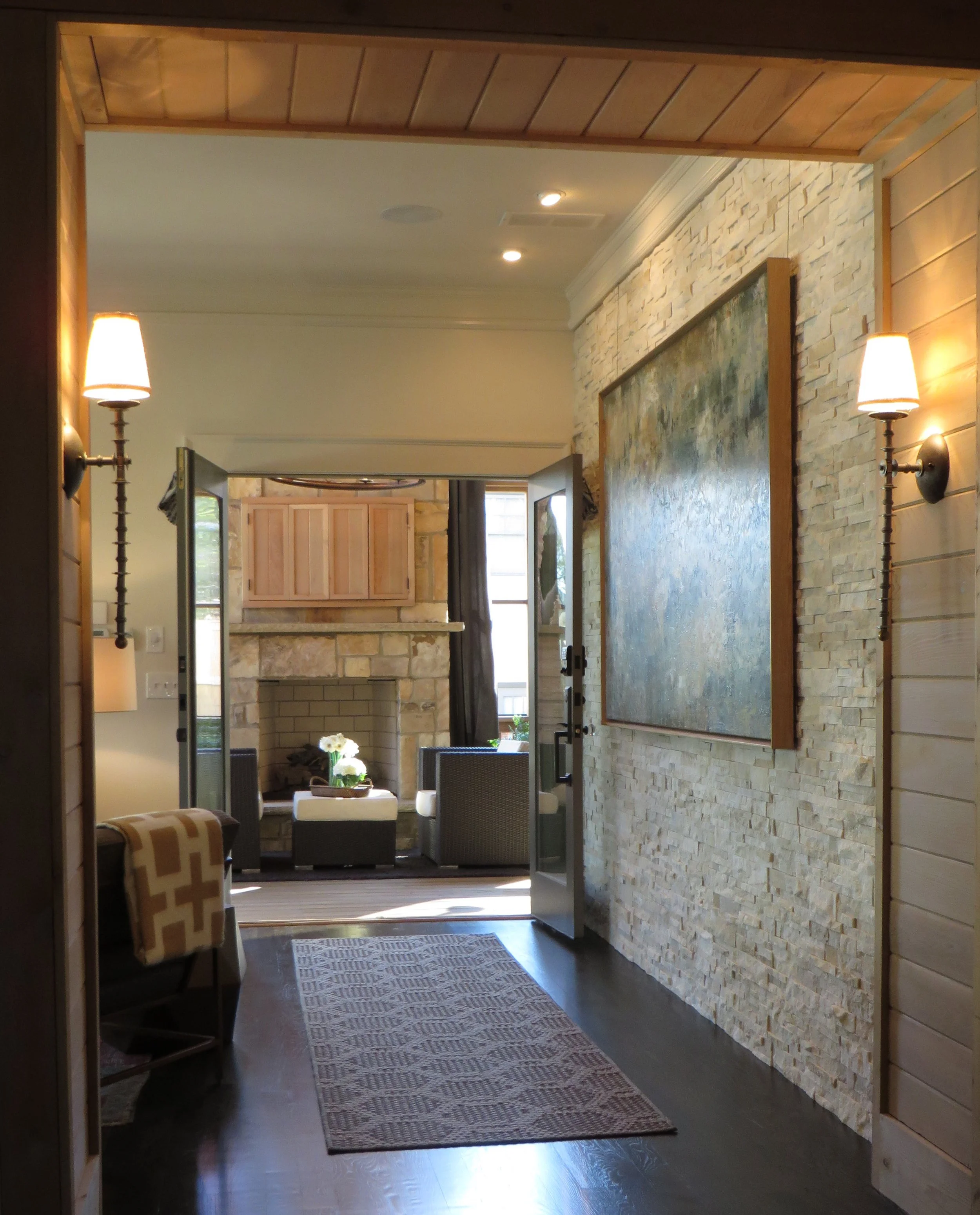 60. Central Hall- View to Outdoor Fireplace.jpg