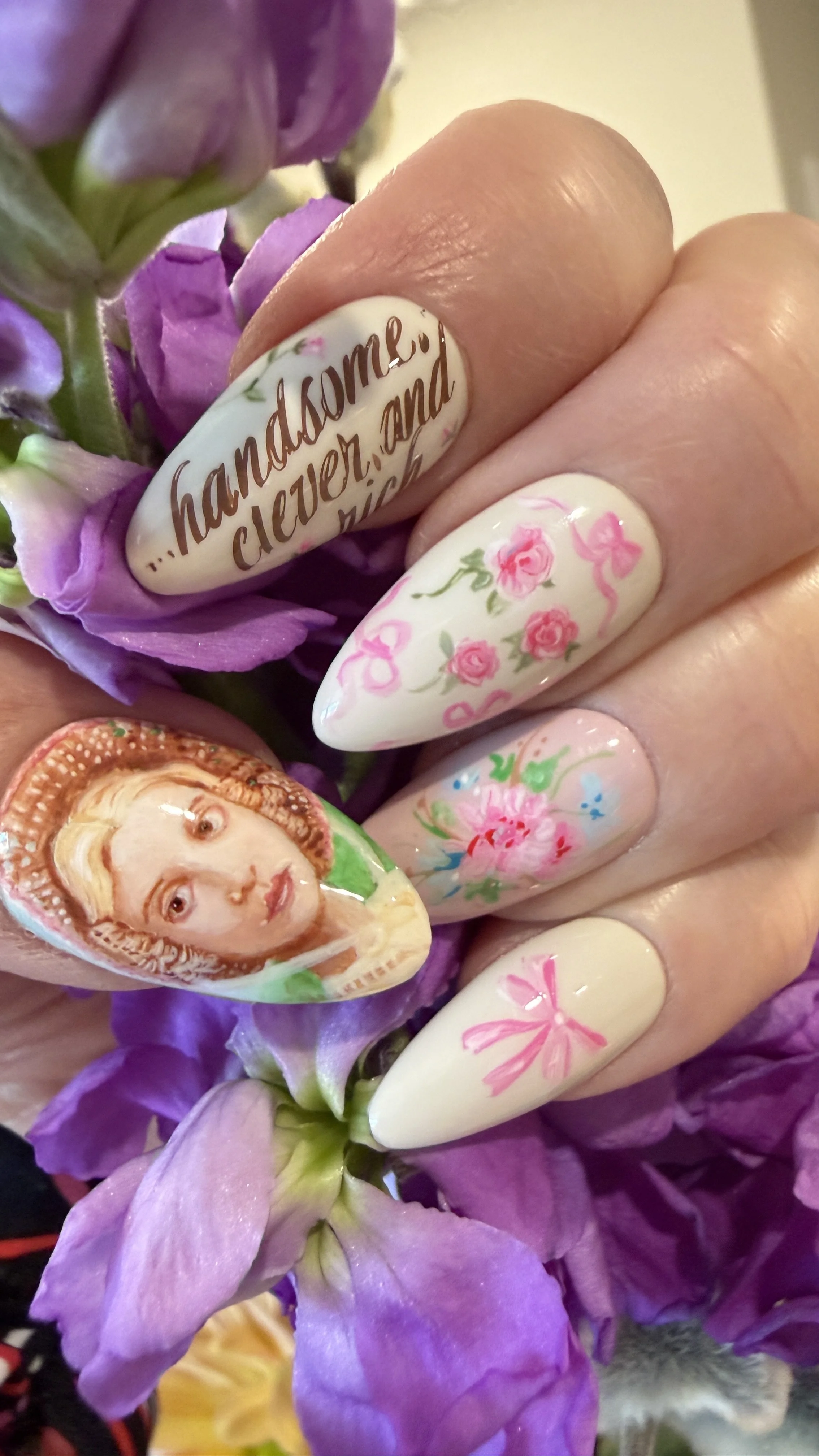 set of press on nails with portrait of Emma character