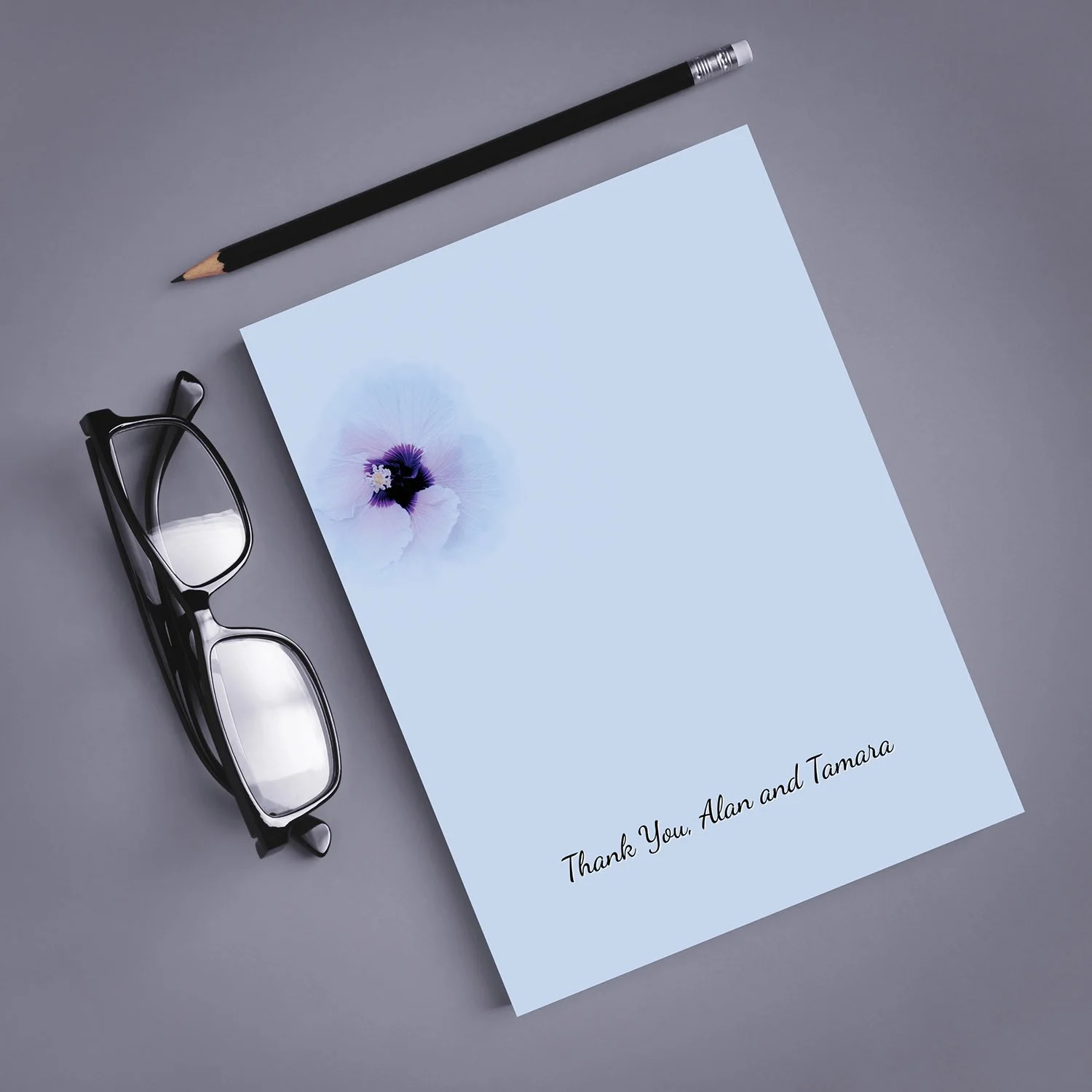 Hibiscus Flower-Blue Background Design Notepad w glasses.jpeg