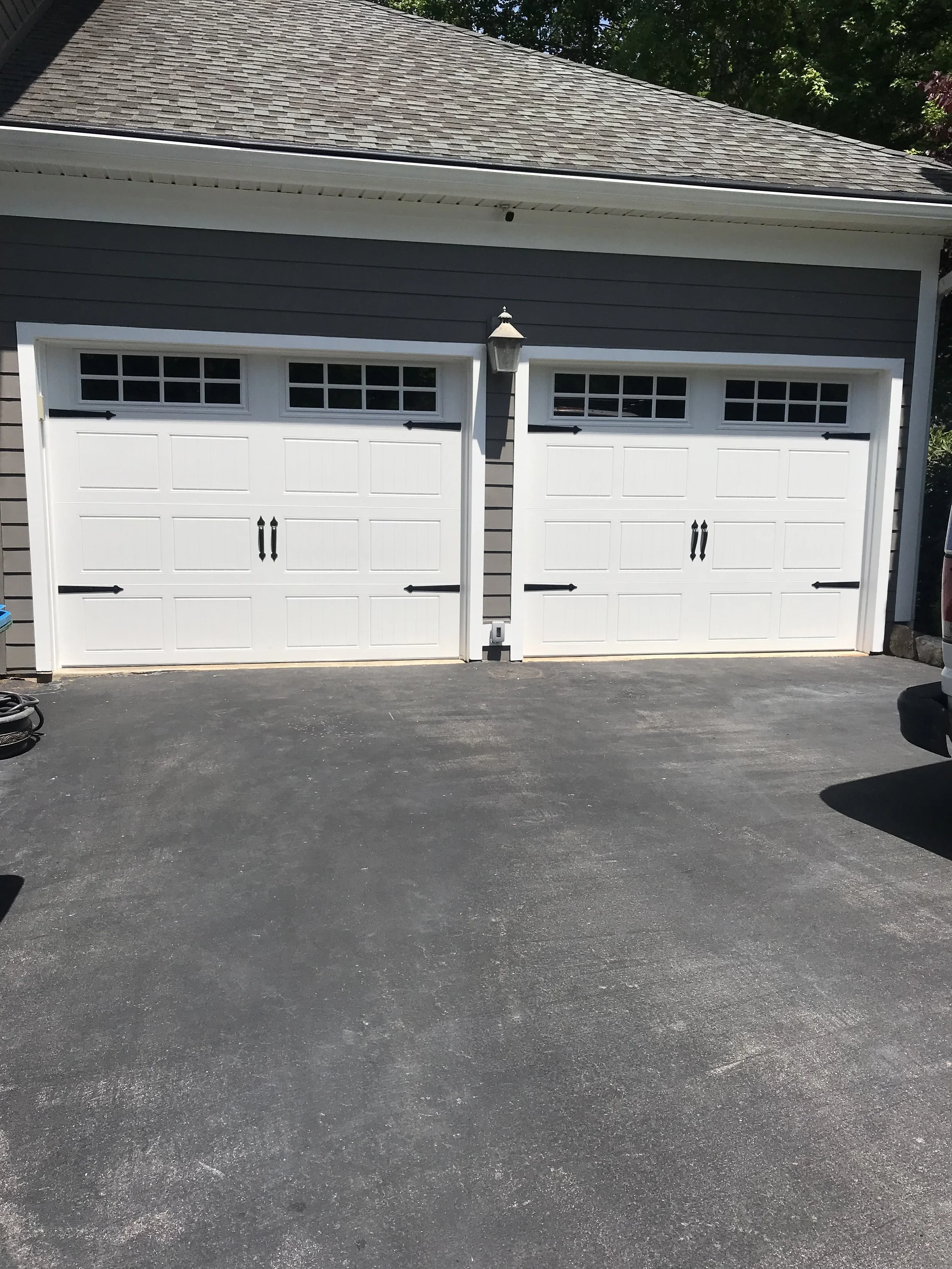 Oranssi technician working on a roof project