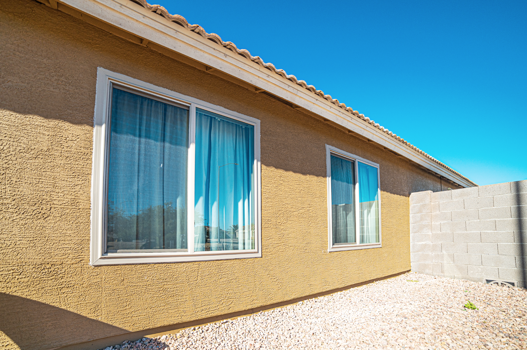 One Glass Package for the Entire House? Why Window Orientation Matters in Arizona