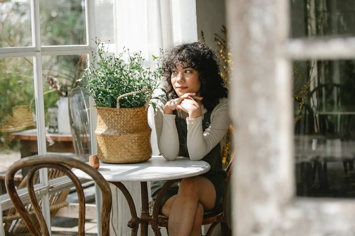 young-woman-in-cafeteria-in-sunny-day