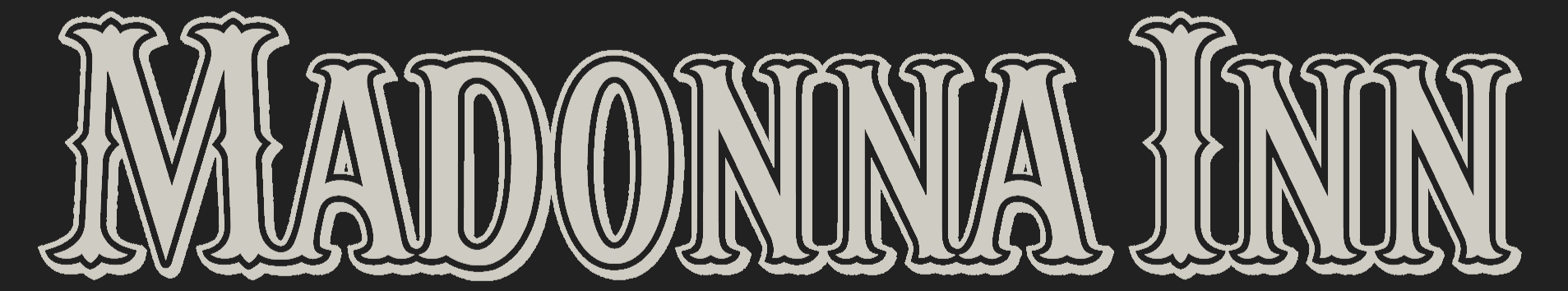 Decorative text spelling 'MADONNA INN' in black and white outline style