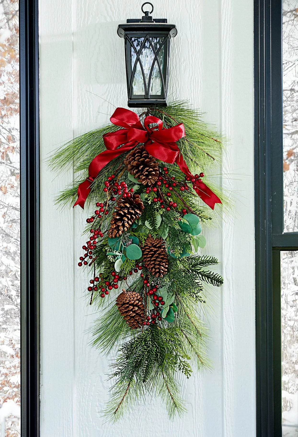 door-wreath-evergreen-holly-pinecones-63f15c9e22bf47d782b9305f418f5f5e.jpg
