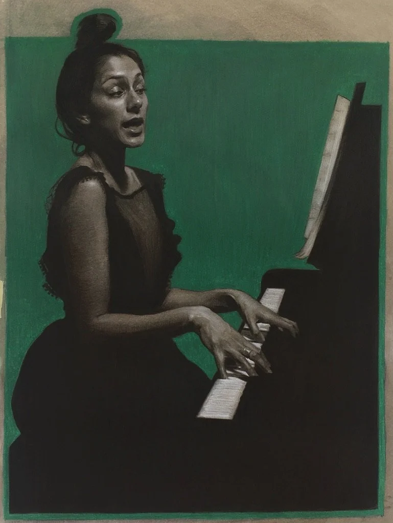 A woman with dark hair styled in a high bun, wearing a sheer black dress, is playing a black grand piano, with sheet music on the stand, against a green background.