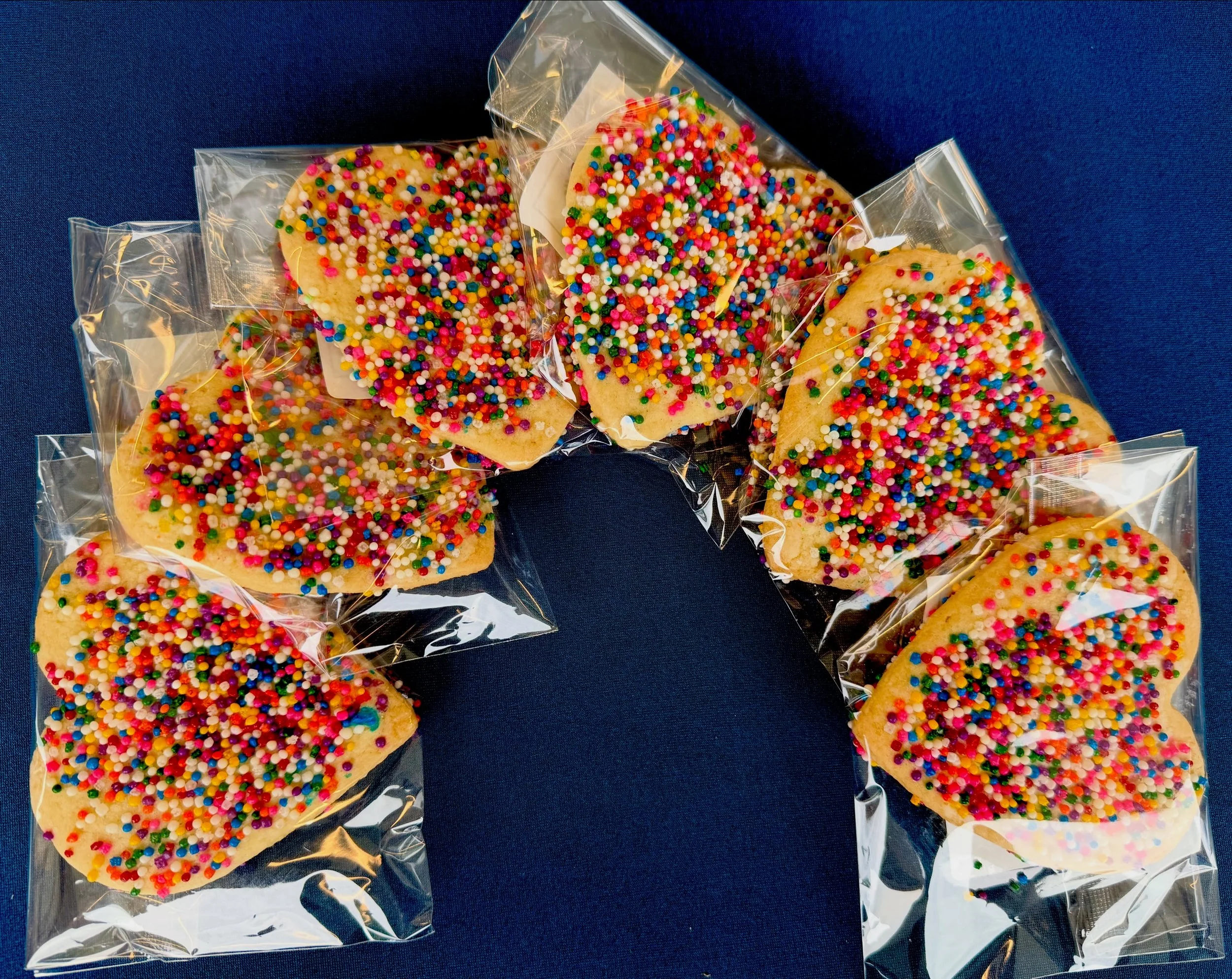 June cookie special: Rainbow Sprinkle Heart Sugar Cookie 🌈❤️🧡💛💚💙💜🌈 Come get them at our markets and in-store all month! #pride #pridemonth