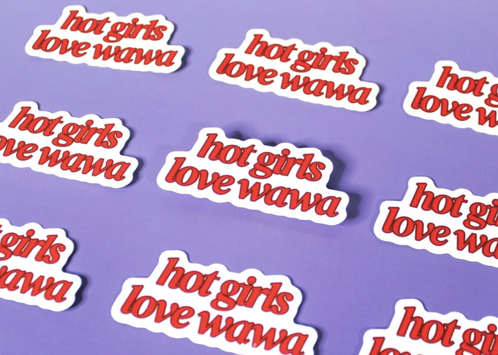 Multiple stickers with the phrase 'hot girls love wawa' in red text on a purple background.